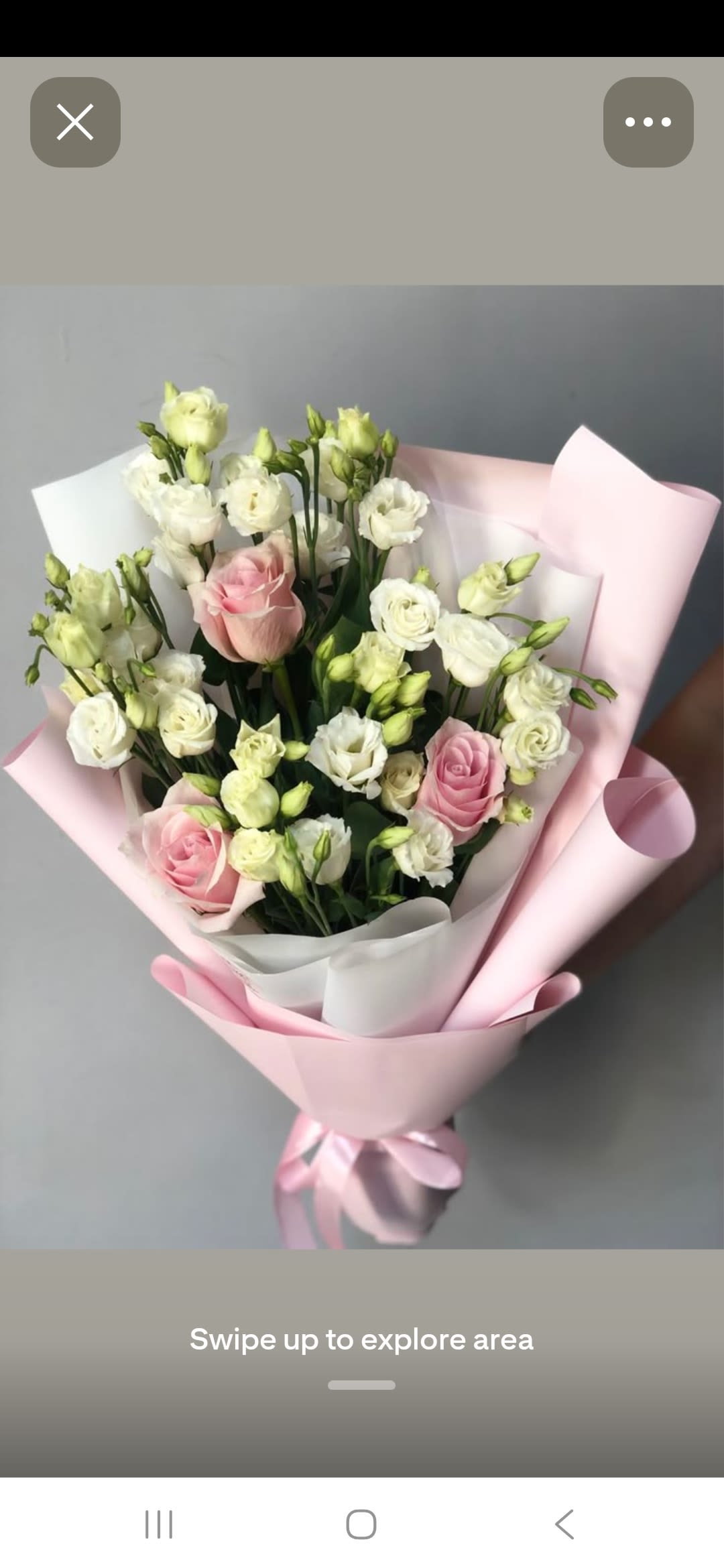 KATERINA - Soft pink roses paired with clusters of white lisianthus create a gently romantic birthday bouquet or anniversary gift that reads as fresh, feminine, and effortlessly elegant. The hand-tied presentation and airy mix of open blooms and tight buds make it the kind of bouquet that will make her feel genuinely celebrated-perfect for Mother's Day, a thoughtful romantic gesture, or any moment you want to mark with soft beauty.  Wrapped in layered pale pink and white decorative paper with a pink satin ribbon and floral wrap, this arrangement offers a polished, gift-ready look. The contrast of the white inner wrap brightens the bouquet while the decorative paper and ribbon add a tactile, luxurious finish-ideal for giving straight from the shop or sending to someone special.