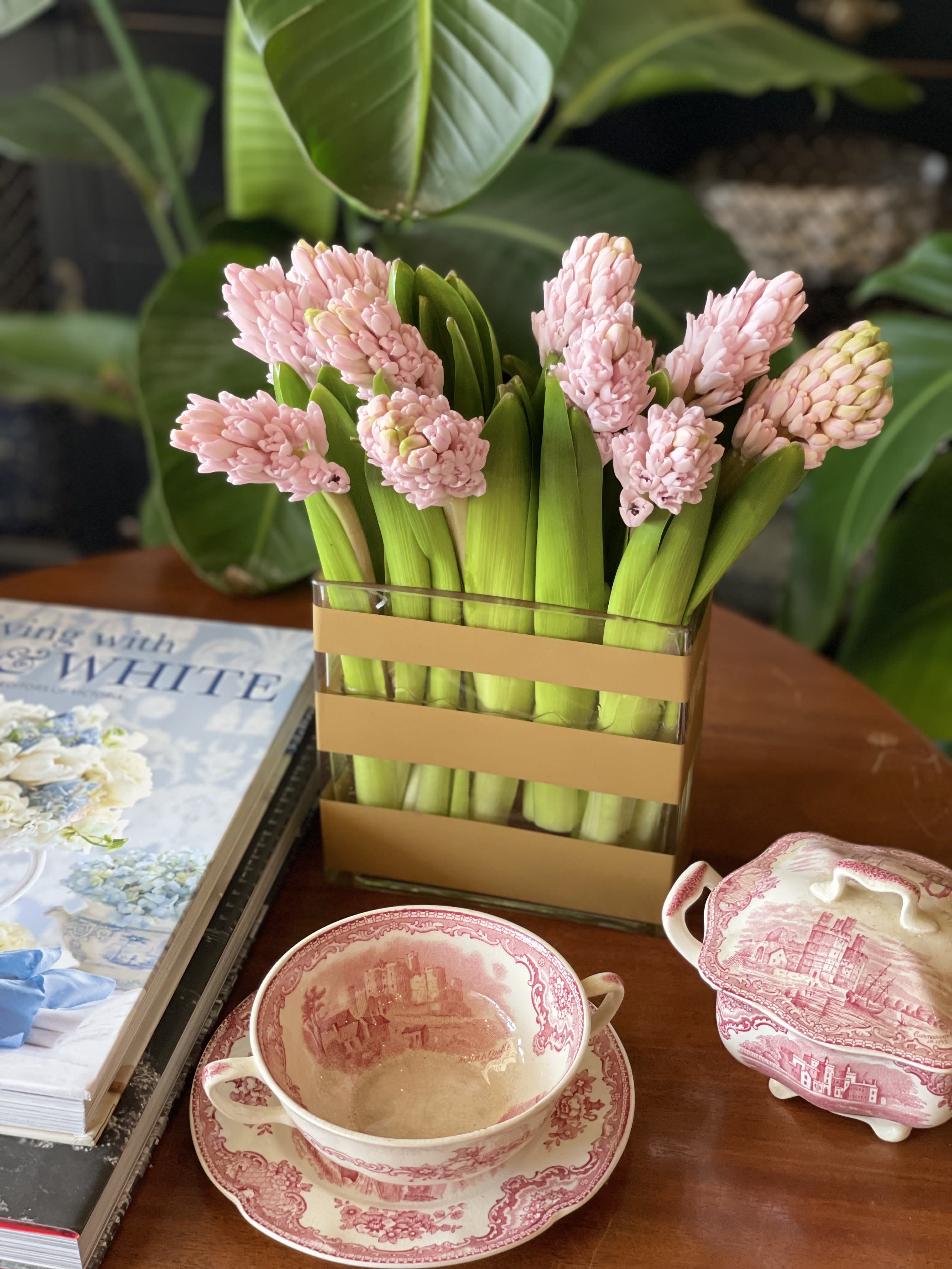 Hyacinth Charm (Pick Up Only) - Say hello to our Hyacinth Charm—fresh from Holland just in time for Mother's Day. A modern arrangement of 10 stunning hyacinths in a sleek glass vase, ready to brighten a space. Available in a beautiful variety of blush pink, lilac, mojito green, blue and deep purple—each one delicately fragrant and full of spring magic.   For local in-store pick-up ONLY. No delivery available.   Please note: Color may vary based on availability, ensuring each arrangement is unique and fresh.  Freshness Guarantee: At Belden's Florist, we stand behind the quality of every arrangement. Our flowers are guaranteed to remain fresh and beautiful for 3–5 days after delivery. While cut flowers may naturally begin to wilt beyond this timeframe, we ensure that only the freshest blooms are selected and expertly arranged to bring joy and elegance to your space. To extend their life, we recommend refreshing the water in your vase daily, allowing your flowers to stay hydrated and continue to dazzle.