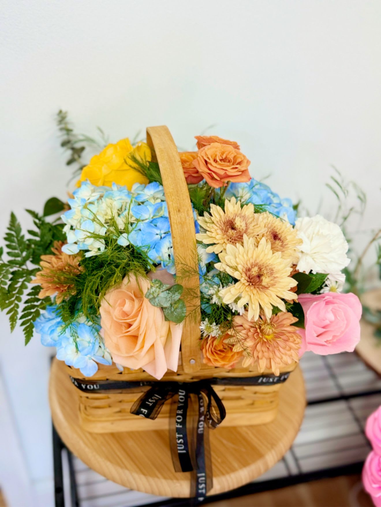 My Canasta  - My Canasta shown in the photo is a sample of our design styles- your arrangement will be uniquely crafted with similar fresh flowers. 