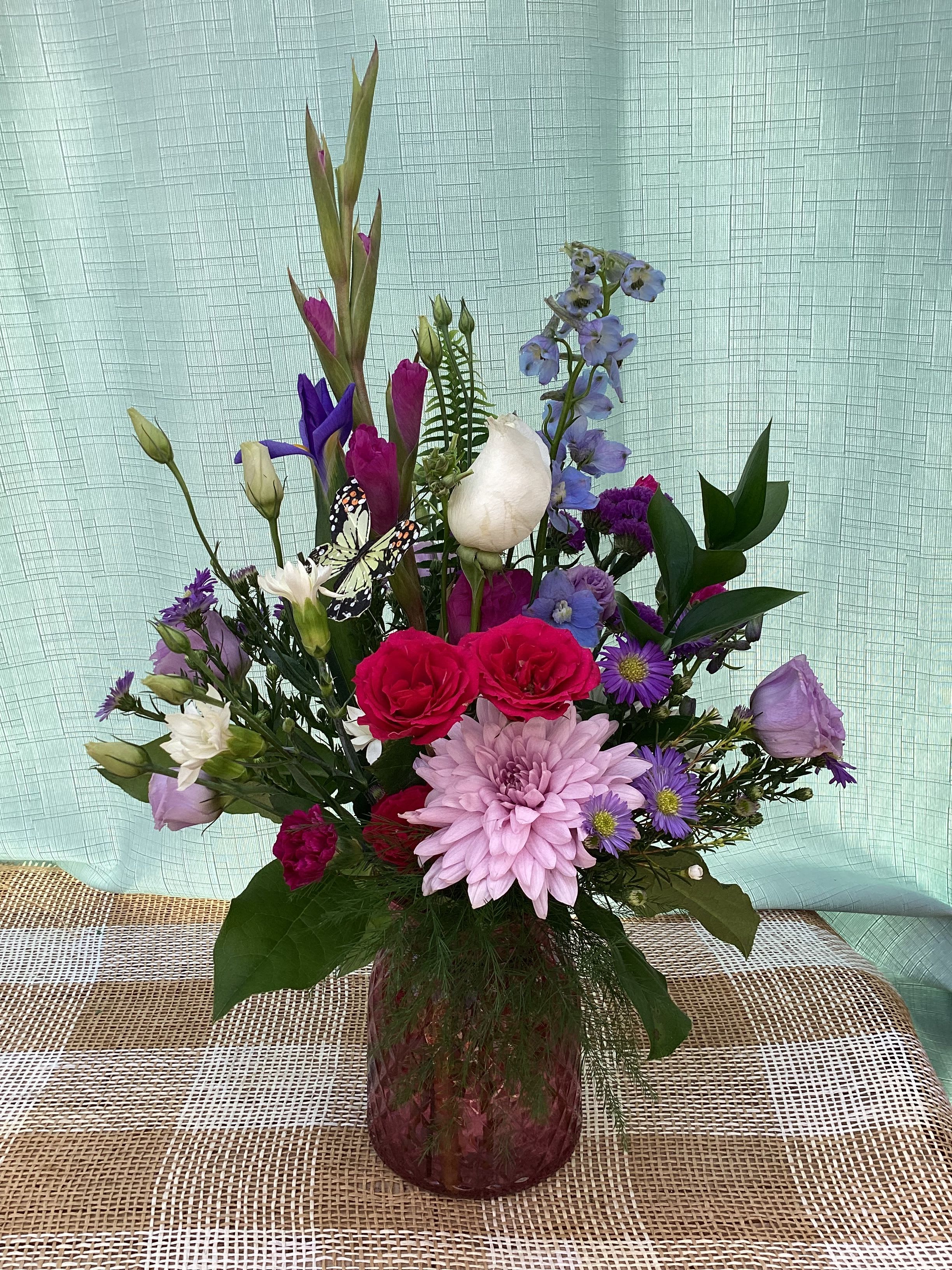 A BLOOMING MOTHER'S DAY - A beautiful arrangement to show appreciation for the mothers in our lives- comes in color vase