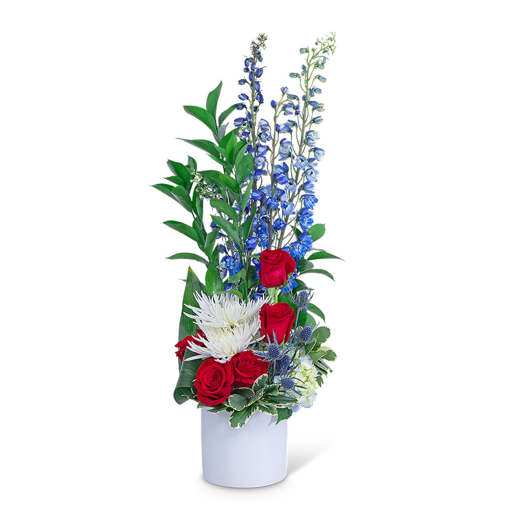 Strength and Courage - Strength and Courage is a popular choice for flowers for Memorial Day or Independence Day and is beautifully shown in red, white, and blue flowers. This patriotic theme is accomplished with Roses, Hydrangea, Spider Mums, Delphinium, and other premium foliage in a classic white ceramic container. Strength and Courage would also be a beautiful tribute to send for a military funeral or for the funeral of a veteran.