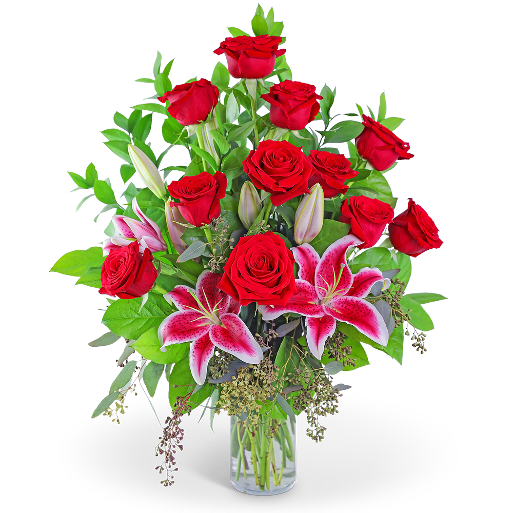 Fly Me to the Moon - Fly Me to the Moon is a beautiful design, perfect for showing your affection to that special someone. It features red roses, stargazer lilies, and premium foliage, all designed in a clear glass vase that will show well on a dining room table, desk, or end table. It is the perfect gift for Valentine's Day, a special Anniversary present, or to just send a reminder of your love.