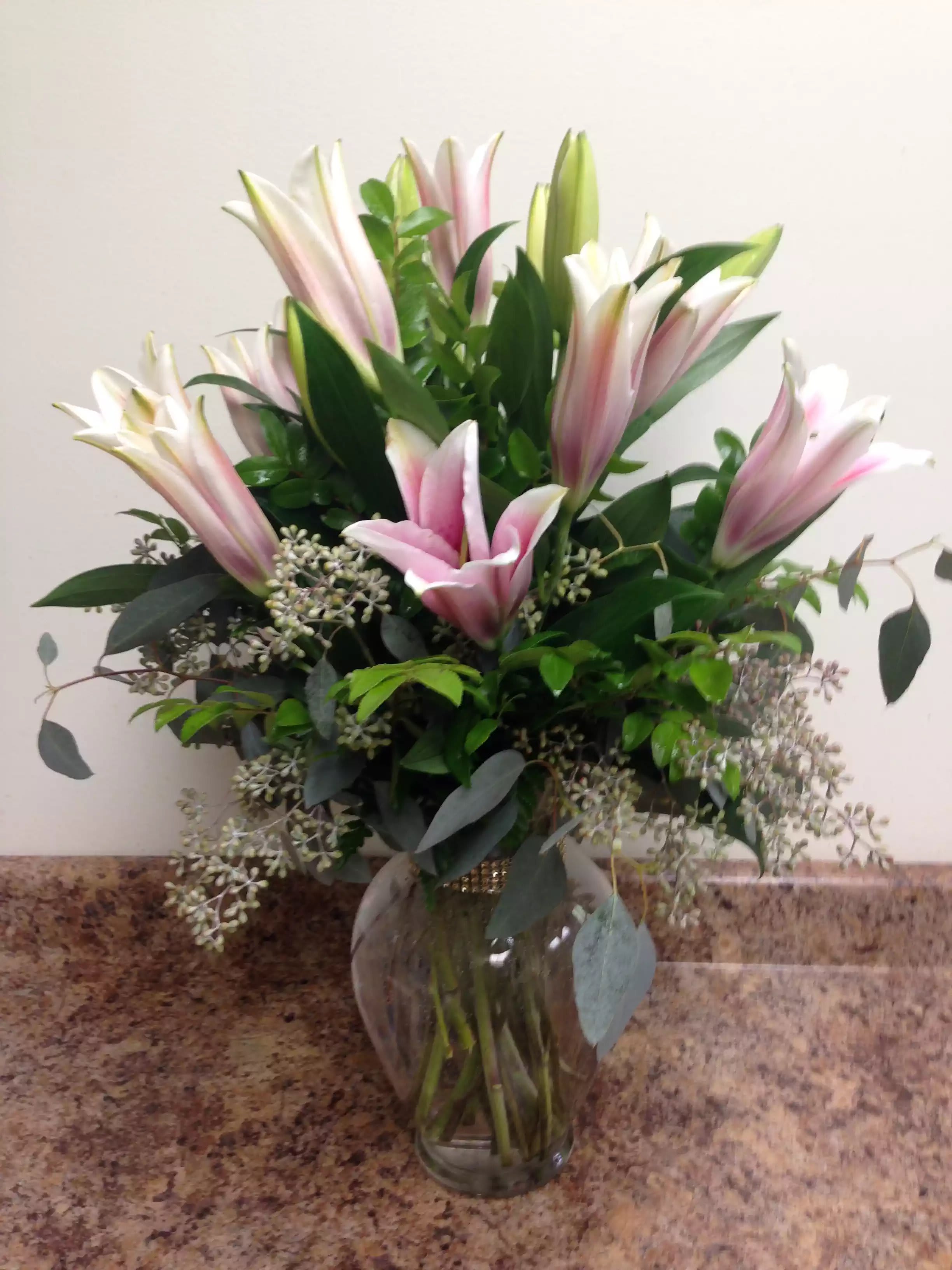 Stargazer Lilies - Elegant stargazer Lilies with beautiful greens and seeded eucalyptus