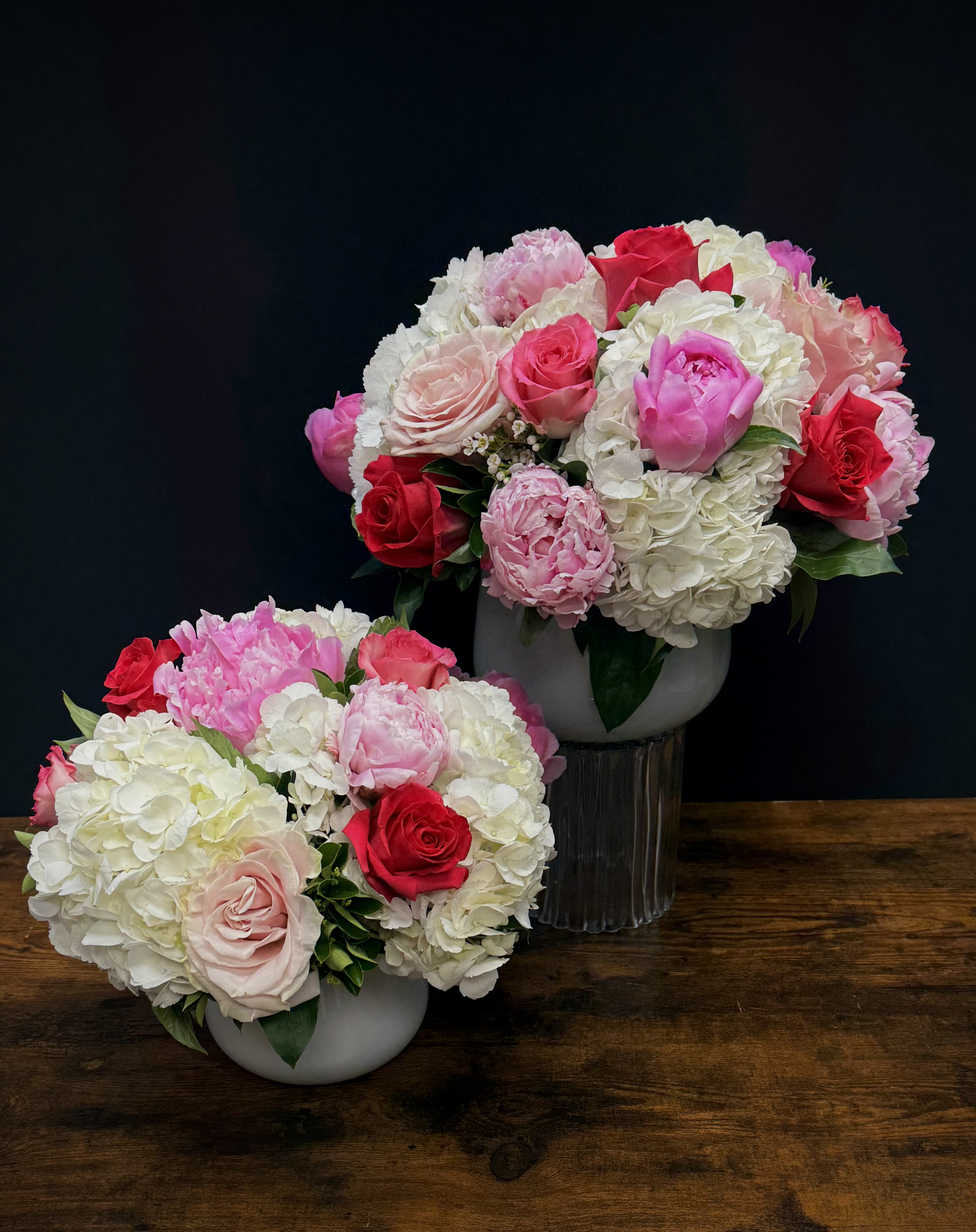 Pink Supreme - A Beautiful arrangemnt of 2 different shades of peonies, 3 different shaeds of roses and white hydrangeas. Beautiful Mother's day rrangement 