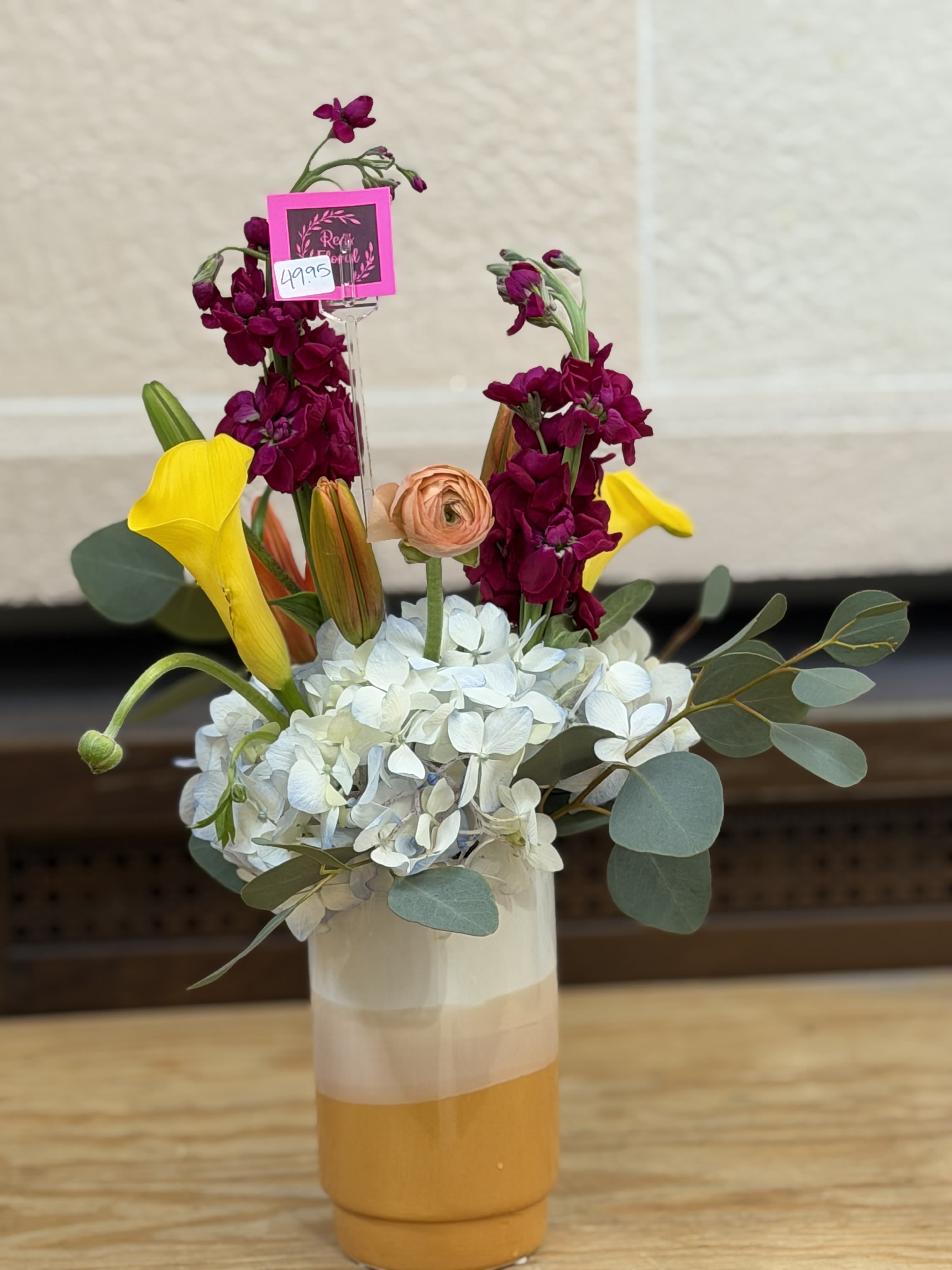 Celebrating Mom Short Vase - Mothers Day Special - A short elegant vase filled with high end blooms including ranunculus, calla Lillies, hydrangeas and more 