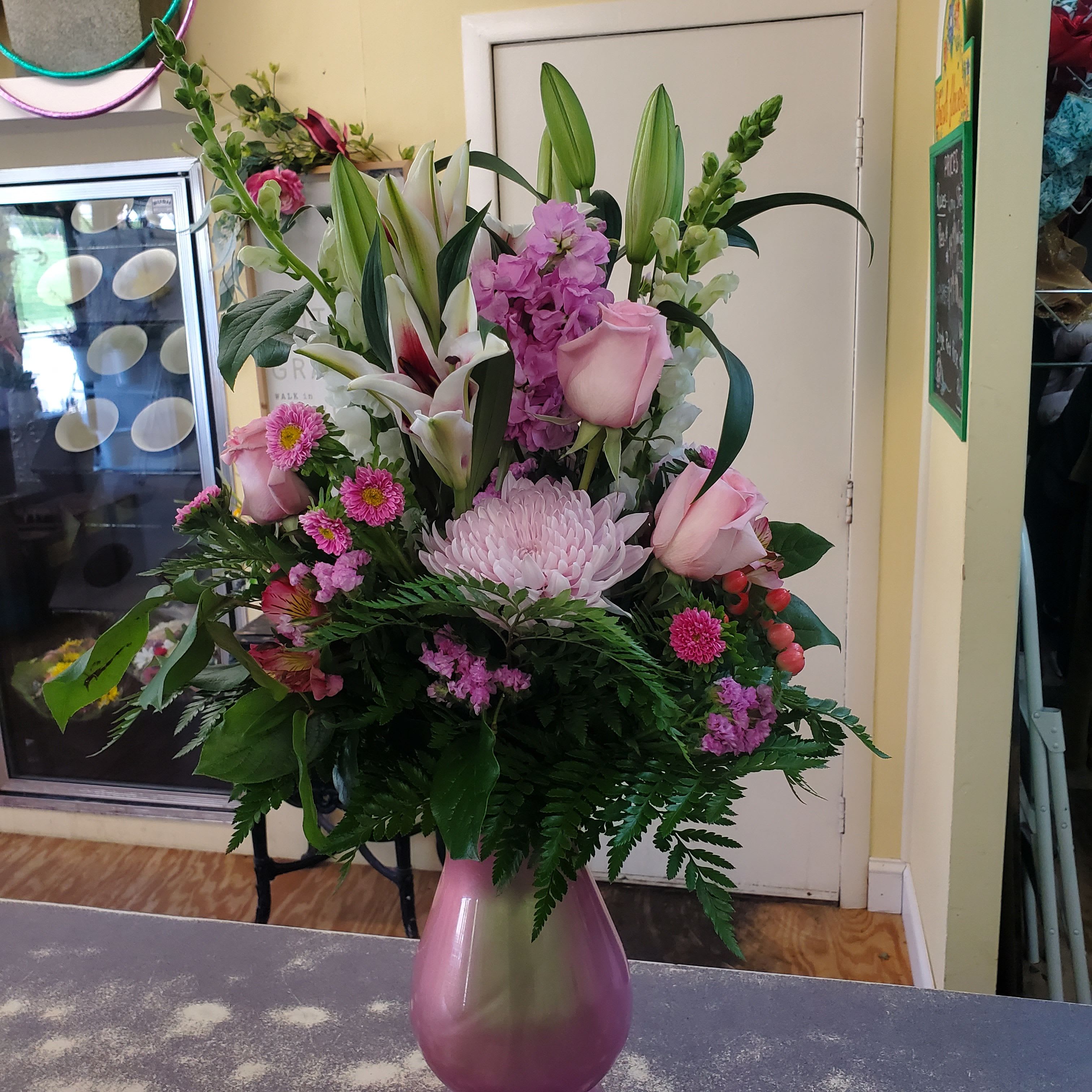 Big Love  For Mom - Large glass vase arrangement filled with a variety of seasonal flowers and colors..Grand presentation for your special Mom. **PLEASE NOTE..COLORS AND FLOWERS WILL VARY DEPENDING ON THE AVAILABILITY OF THE DAY ** 