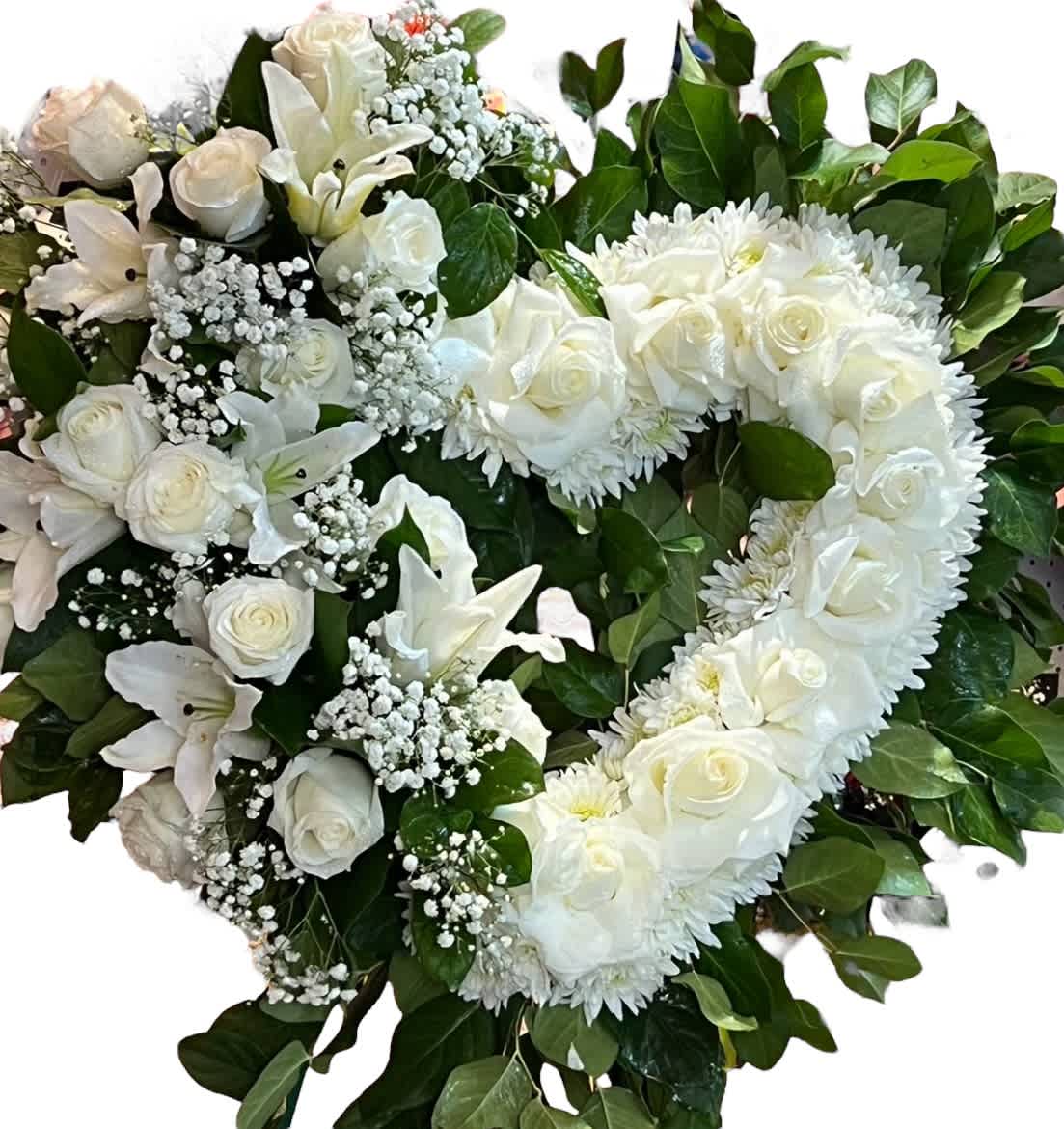 Heart-shaped white floral arrangement with roses and lilies