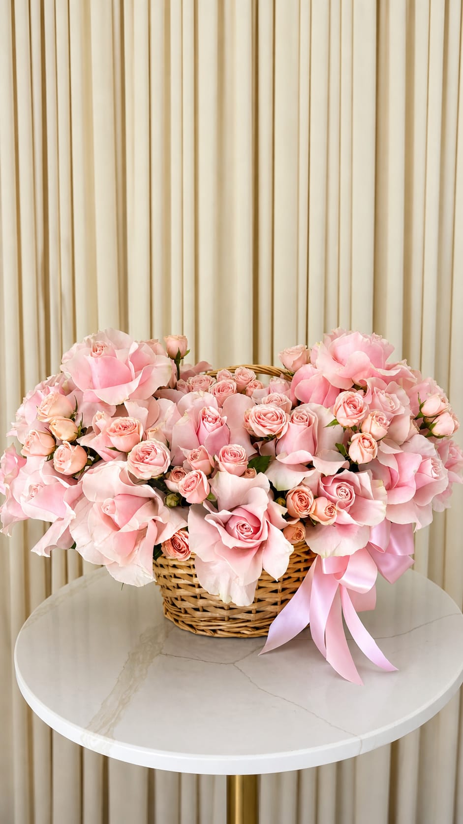 Pinks And Petals - Soft, romantic, and effortlessly beautiful, Pinks &amp; Petals is a lush basket arrangement that celebrates the timeless charm of pink florals. Featuring a harmonious blend of blush, soft rose, and vibrant pink blooms, this design creates a layered palette that feels both fresh and full of life.  Each flower is thoughtfully arranged to achieve a natural, garden-inspired look, with gentle movement and rich texture throughout. The classic basket base adds warmth and softness, complementing the delicate tones of the blooms while giving the arrangement a relaxed yet elevated feel.  Perfect for heartfelt gifting, celebrations, or simply brightening a space, Pinks &amp; Petals brings a sense of sweetness, beauty, and everyday luxury to any moment.