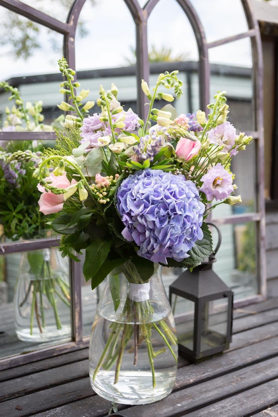 Lavender and pink bouquet in a clear glass vase