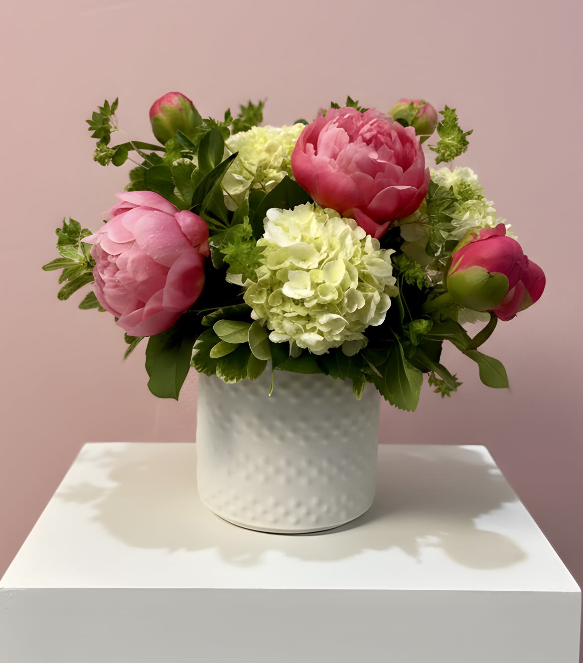 Peony Mood - A modern, elegant arrangement featuring lush peonies, mini hydrangeas, and refined greenery. Soft, elevated, and designed to capture a feeling as much as a look.