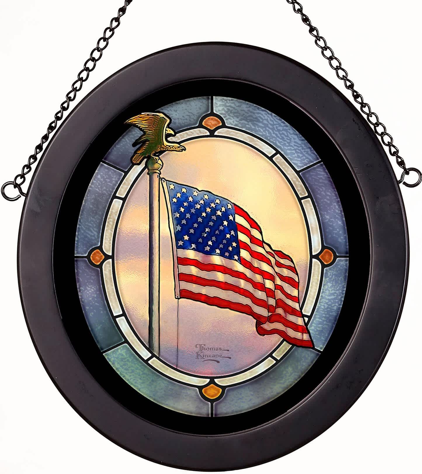 Round stained-glass panel with an American flag and eagle topper in a black frame