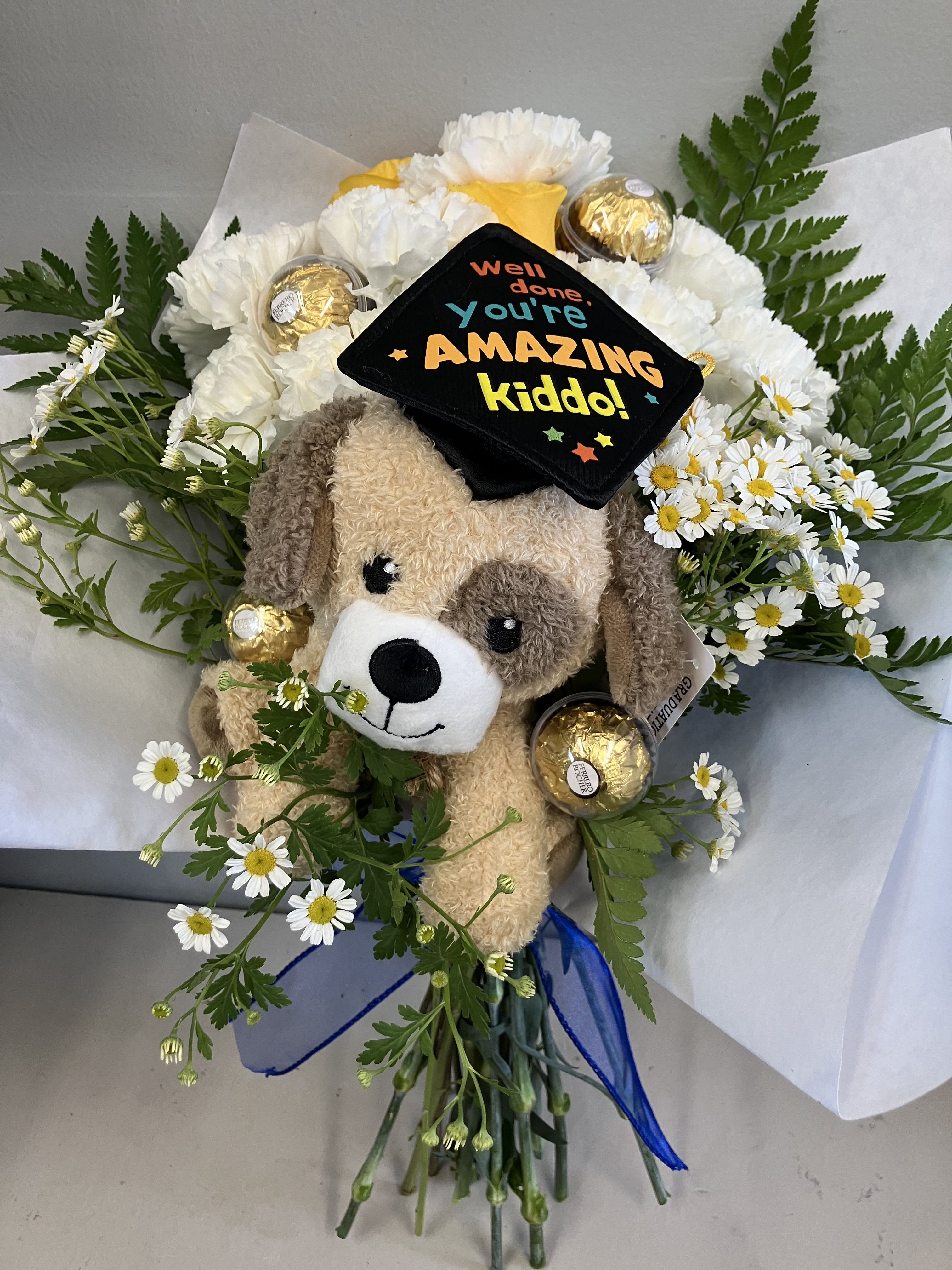 Wrapped Graduation Teddy Bear - Cute graduation gift! Cheerful yellow roses, white carnations and dainty chamomile with chocolates and a bear 