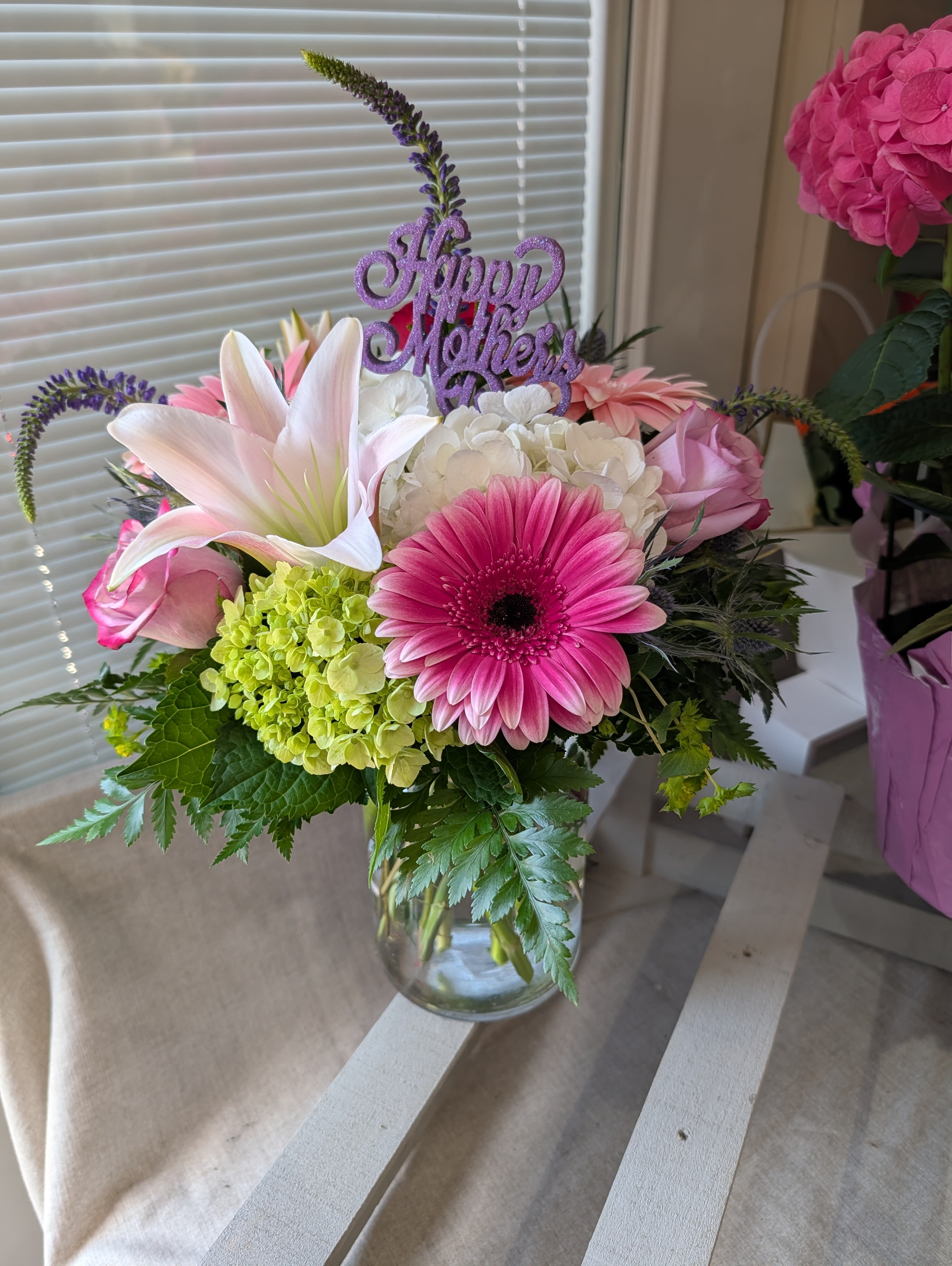 Mothers Day Milk Jug - Seasonal blooms in a milk jug vase