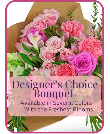 Pink mixed flower bouquet wrapped in brown paper
