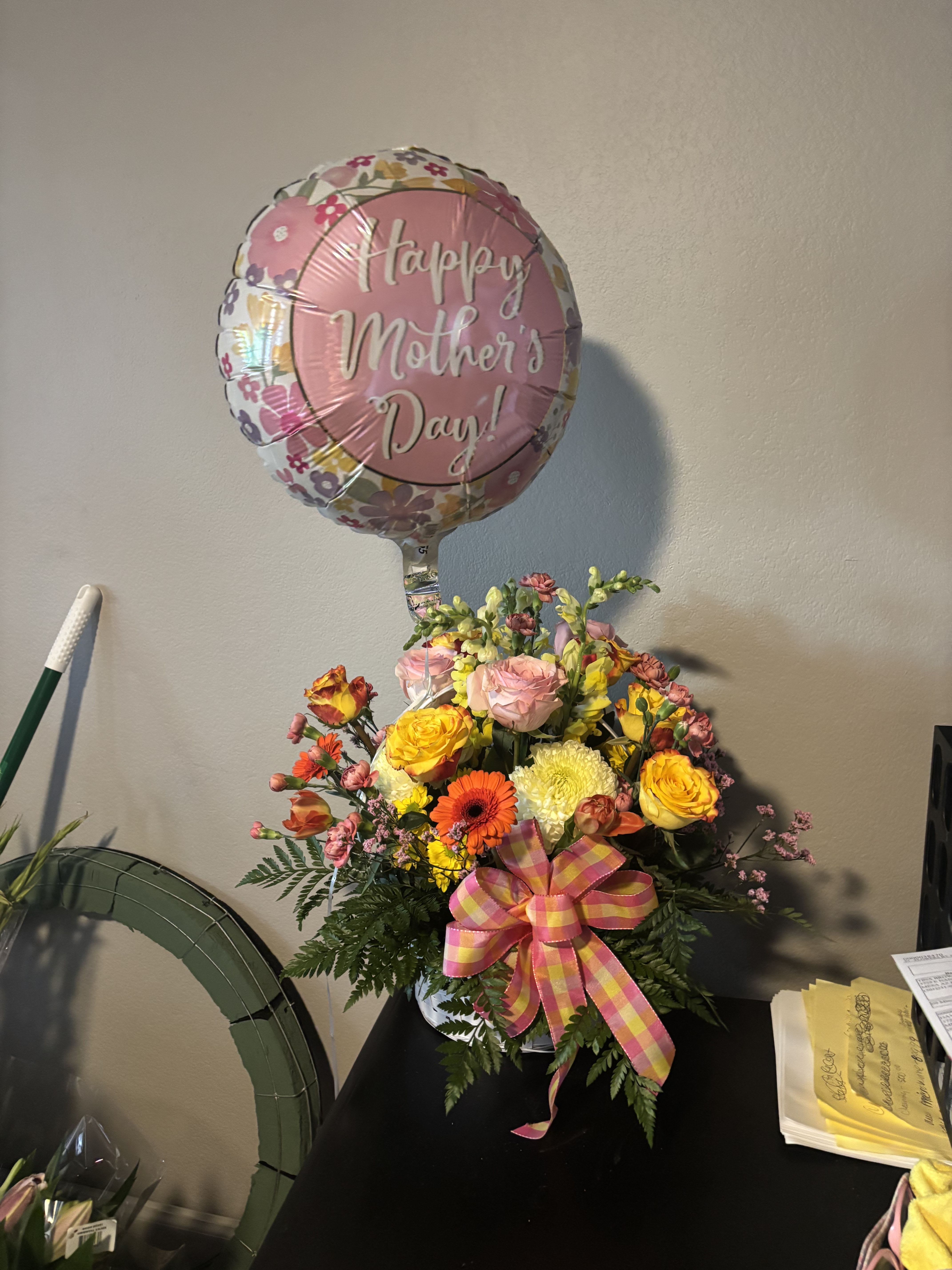 Mother's day special basket bouquet  - Beautuful basket of mixed roses, tulips, mums, daisys etc. with a pretty ribbon and balloon 
