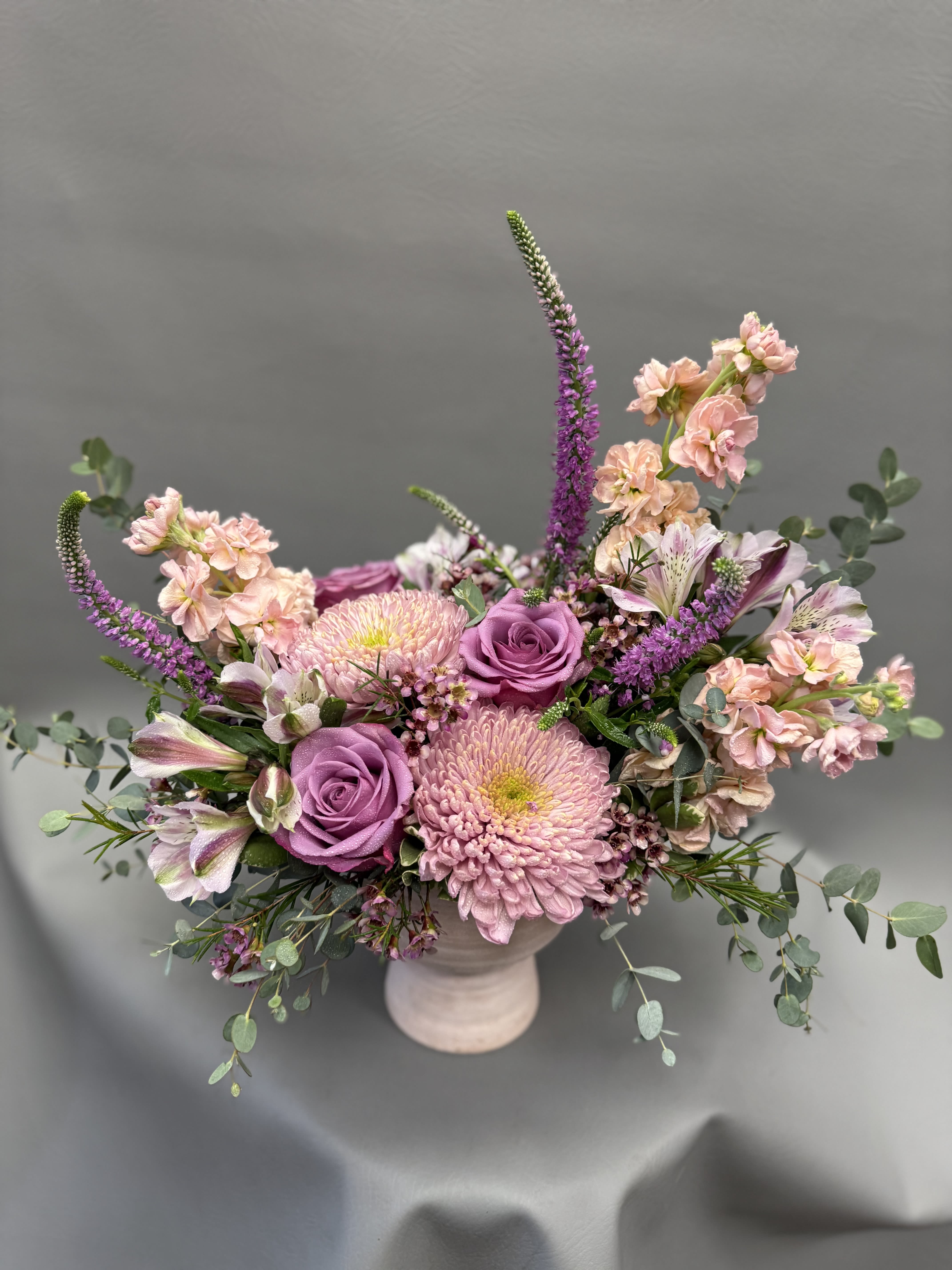 Blush Garden Harmony - A soft mix of blush roses and seasonal blooms, perfect for celebrating Mom.