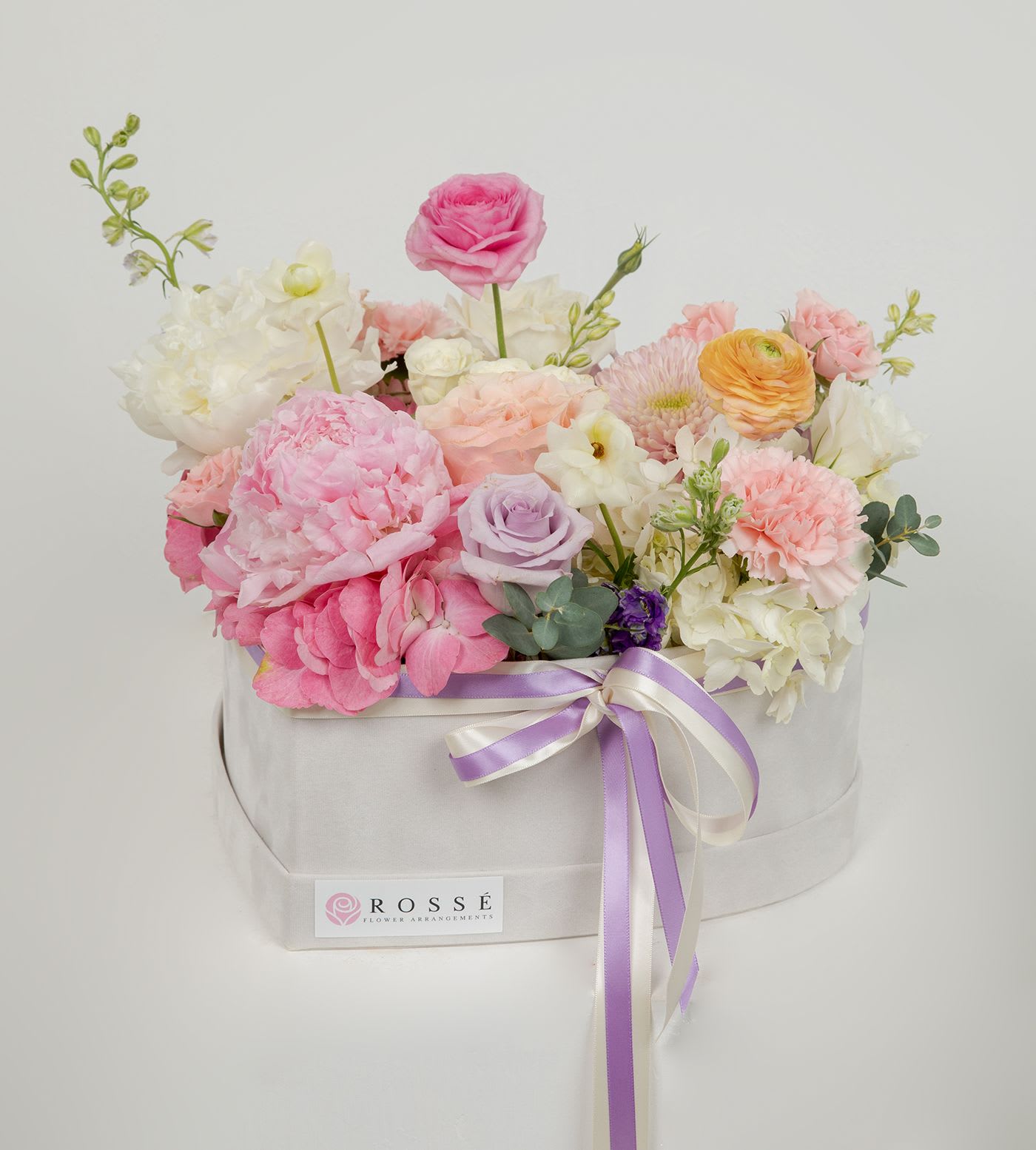 My Love in Pink  - A garden-style mix flower arrangement in a velvet heart box. Soft pastel blooms and natural textures create a romantic, effortless feel—perfect for any meaningful moment.  Flower types may vary depending on the season. #mom #mothersday #mother  