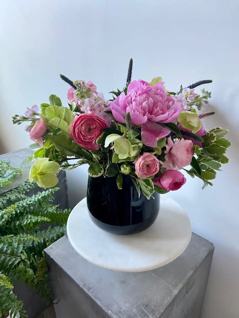 Pink Lady - We gathered the most beautiful flowers harvested from spring for this arrangement. Peonies, Ranunculus, Hellebore, and stock. 