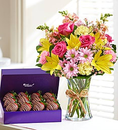 Fields of Europe and Fresh Dipped Strawberries in Chocolate - This delightful pairing was created with Mom in mind. A dozen of our juiciest strawberries are dipped and decorated to look their most delicious. We’ve brought this sweet treat together with our best selling bouquet, inspired by the vibrant colors of the European countryside. It’s a classic gift that’s sweet and beautiful, just like her!