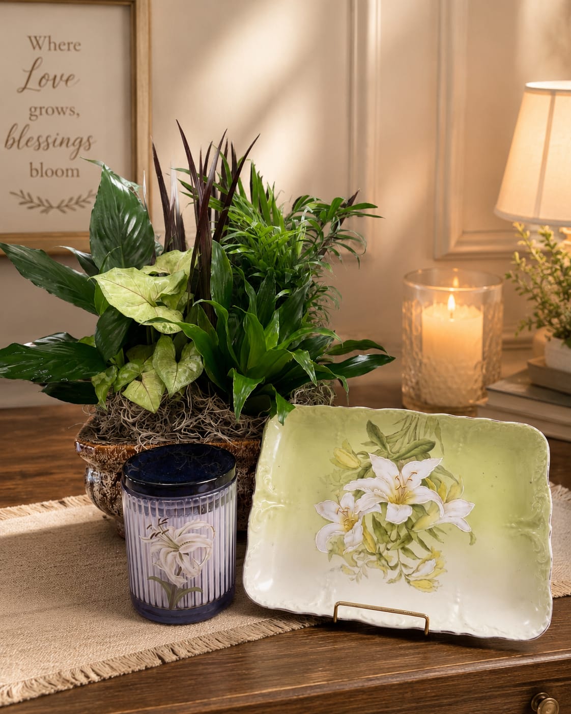 Lily Garden Retreat  - A sophisticated gift collection featuring a lush European-style green plant garden, elegant decorative floral tray, and luxury scented candle. Designed with natural textures and timeless beauty, this gift brings warmth, serenity, and lasting enjoyment to any home or office.