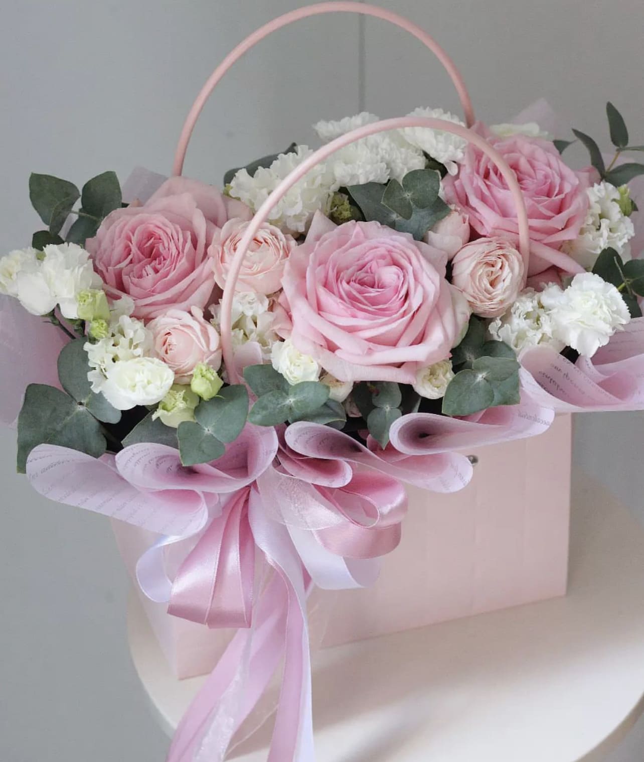 Pink Tote Box  - Pink tote box filled with mixed flowers.