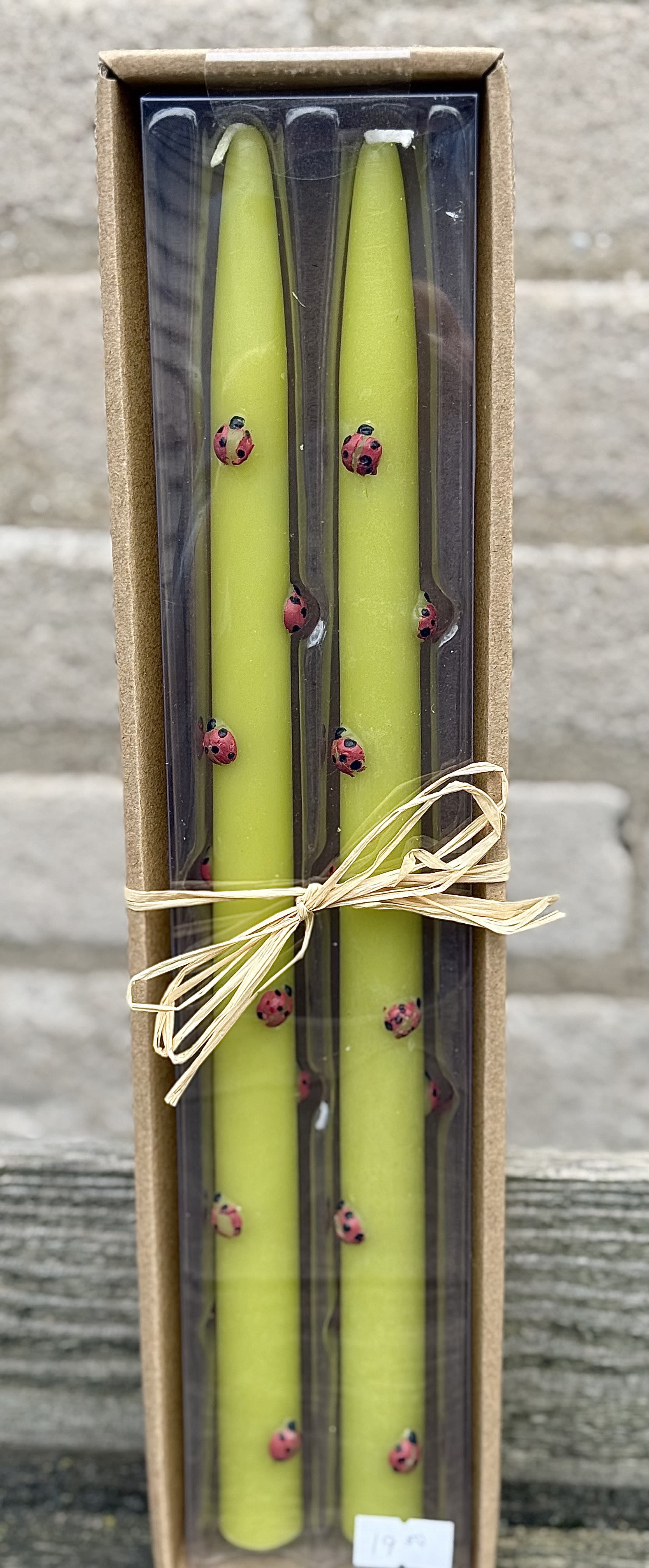 Bee candle - Bright lime-green taper candles dotted with tiny red-and-black ladybugs bring a playful, whimsical flourish to a Mother's Day gift, birthday surprise, or just-because treat. This boxed pair feels handmade and joyful-the kind of home accent that will make the person you're thinking of smile and remember the thought behind it, whether for a spring or summer celebration, a cheerful housewarming, or to brighten a bedside during recovery.  Each tall taper is presented upright in a clear plastic insert inside a recyclable brown gift box, tied with natural raffia for rustic charm. The vivid green, punctuated by the little ladybug accents, reads fresh and gardenlike alongside seasonal table settings for Memorial Day, Labor Day, Thanksgiving, or an autumn centerpiece. Packaged ready to gift, these tapers also pair beautifully with a bouquet or houseplant for anniversaries, graduations, new baby celebrations, or holiday hostess gifts.  Light these candles with care on a stable, heat-resistant surface away from drafts and flammable materials; they are primarily decorative and meant to delight the recipient long after the flame has been enjoyed. Available boxed for easy giving-perfect for thinking-of-you moments, thank-you gestures, prom and wedding favor touches, or a charming addition to seasonal gift sets.