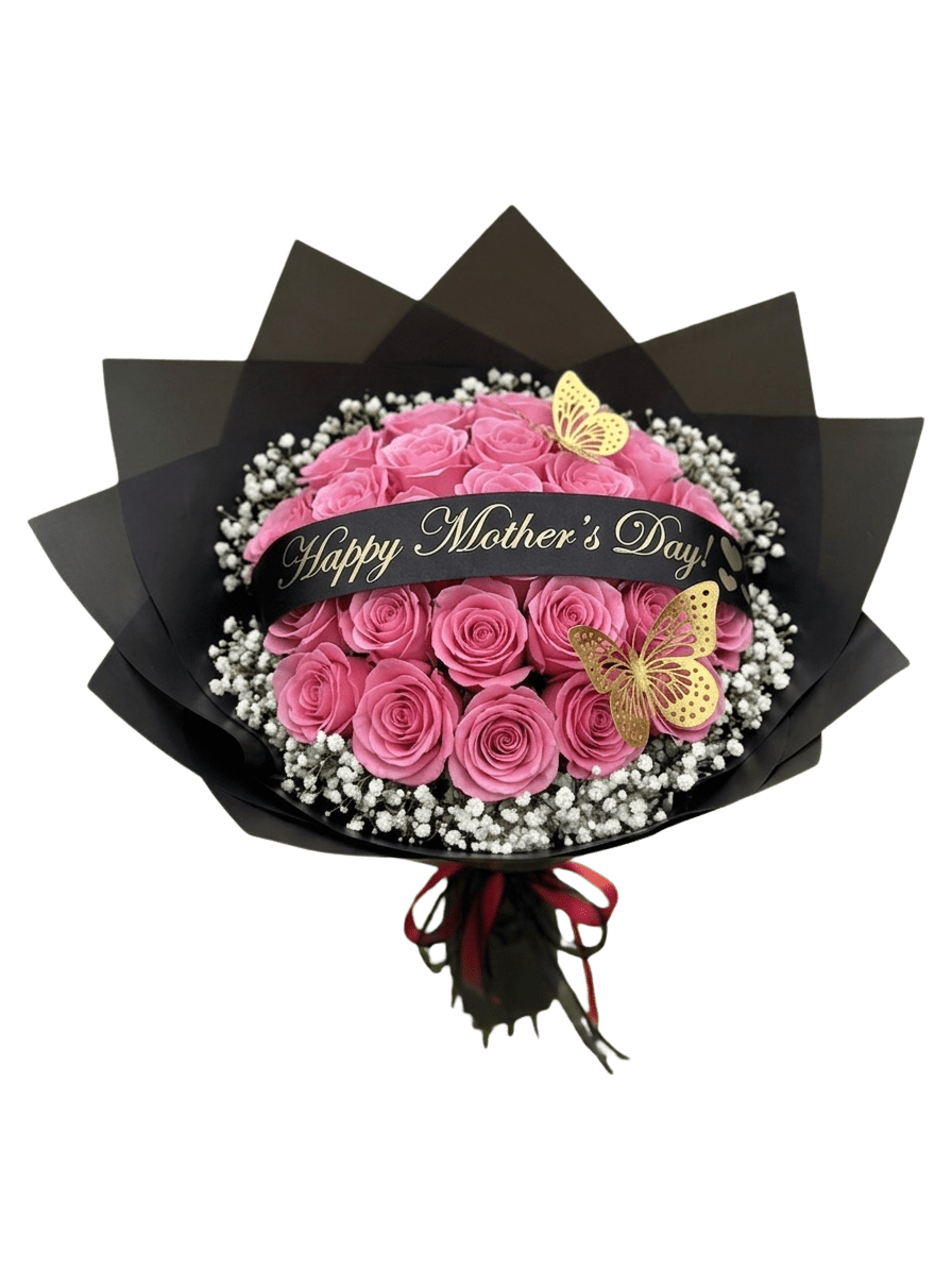 Bouquet 25 roses pink  - A lush dome of 25 pink roses makes an unforgettable Mother's Day bouquet that feels both romantic and modern. This flower arrangement for Mother's Day centers on a compact, rounded spray of soft pink roses so abundant they read like a single cloud of petals-perfect for making the person you're celebrating feel cherished and adored.  Small white filler blooms circle the roses to add delicate contrast while dramatic black wrapping paper and a black ribbon printed with "Happy Mother's Day!" give the bouquet a contemporary, gift-ready polish. Two gold butterfly picks add a joyful, feminine detail that catches the eye; the arrangement is finished with a decorative ribbon to keep the shape neat and elegant.  Designed to delight mom on her special day, this bouquet suits mothers, grandmothers, or any woman you want to honor with a refined, celebratory gift. Keep stems in fresh water and trim as needed to extend vase life; select same-day delivery when you need the surprise to arrive exactly on Mother's Day.