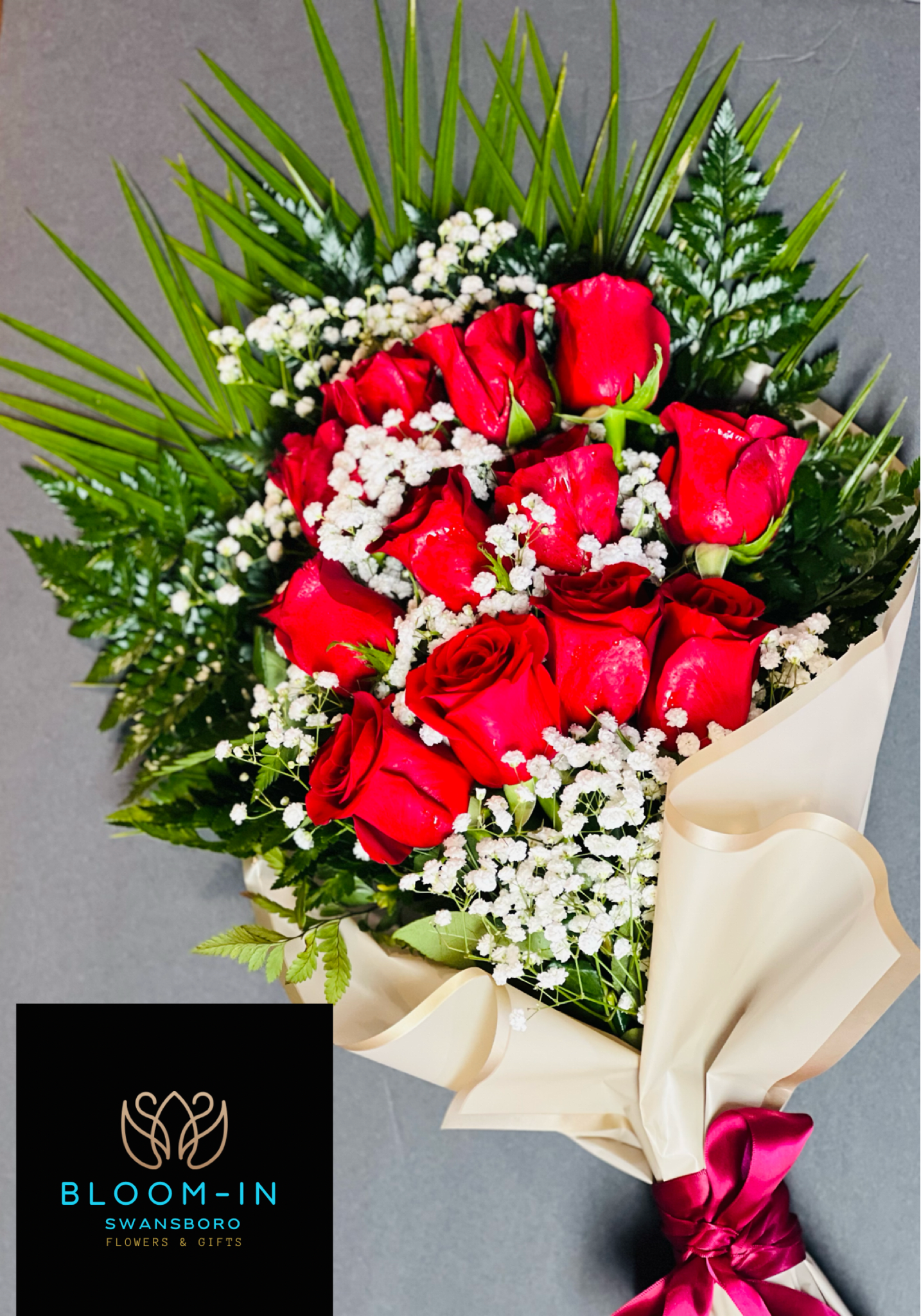 Dozen wrapped roses - Beautifully wrapped dozen of red long stemmed roses.