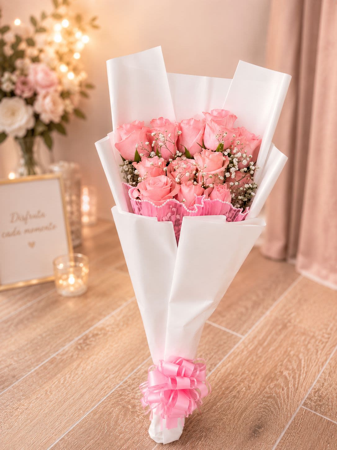 12 Light Pink Roses - Radiant Days - 12 Light Pink Roses Wrapped in Paper with a Decorative Bow