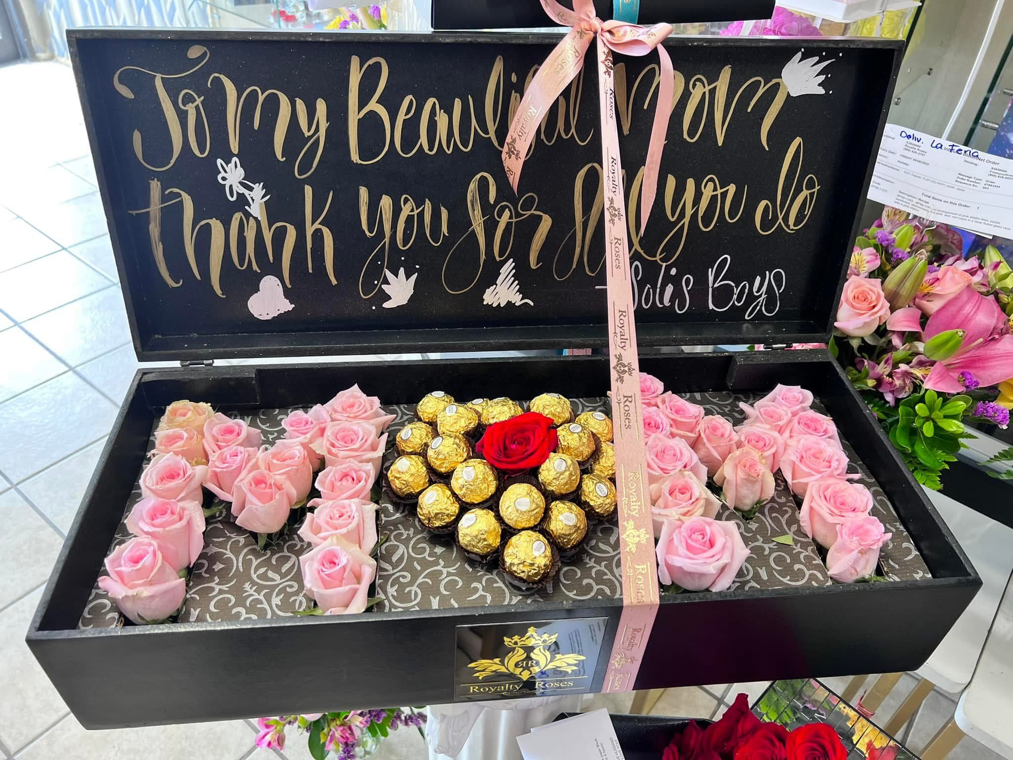 Black gift box with pink roses and Ferrero Rocher chocolates