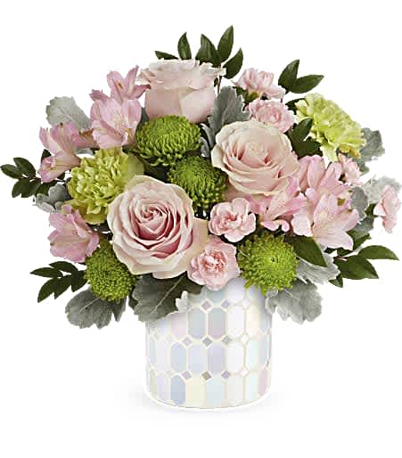 Pink roses and green mums in a patterned vase