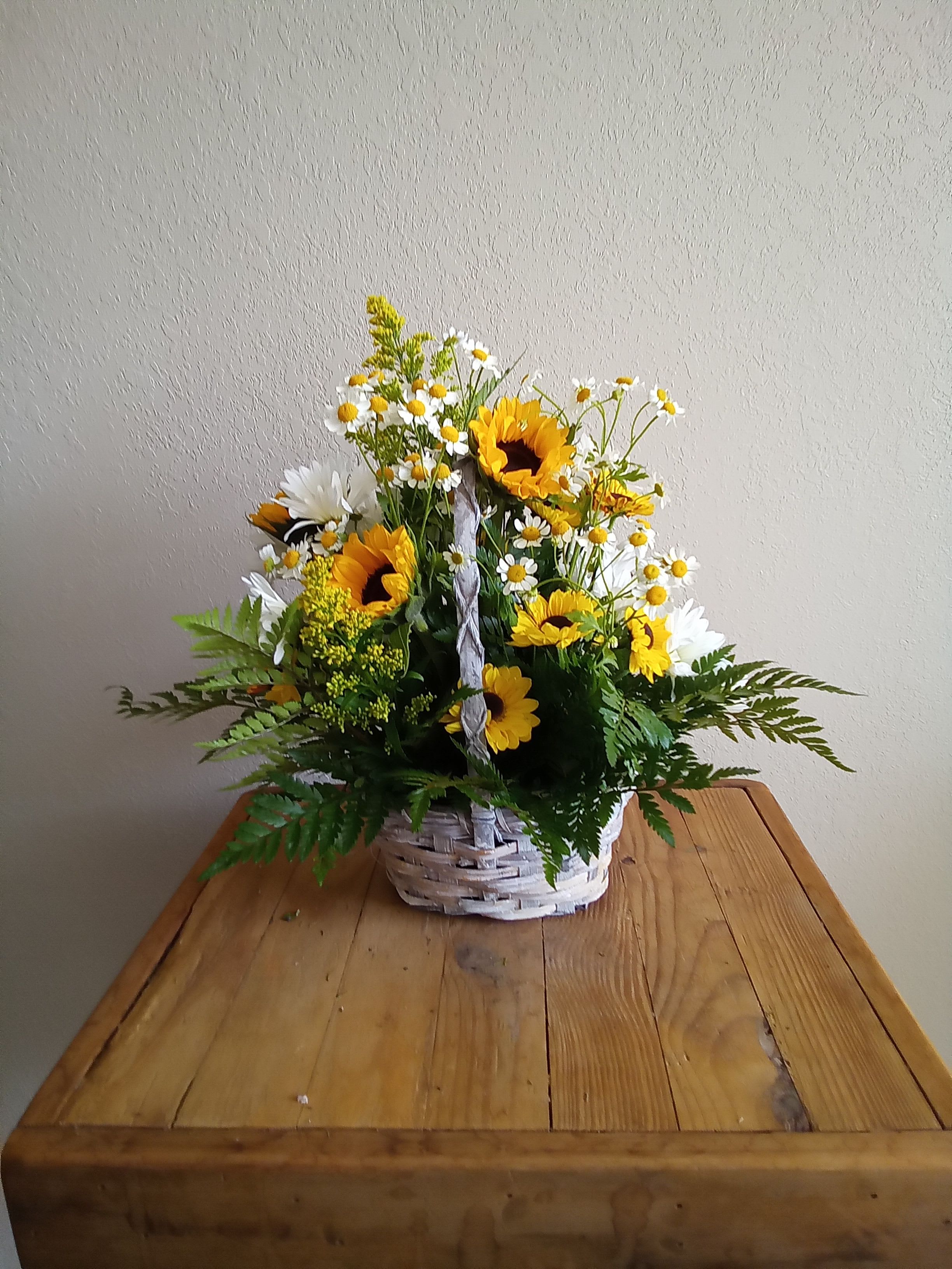 Sunflower Love - This Sunflower basket with white and yellow daises and sunflowers, is the perfect way to express your thoughts.