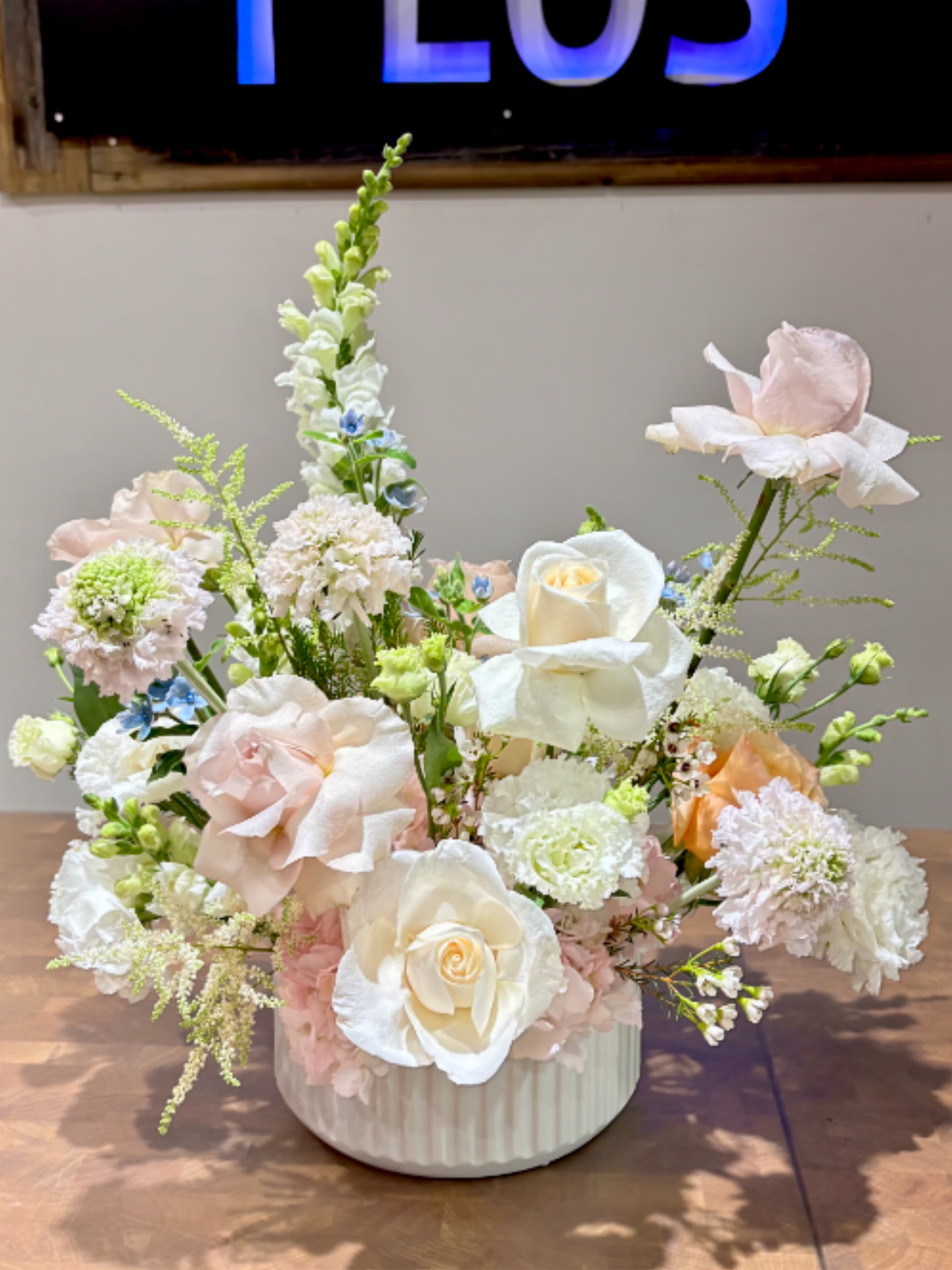 BP99 - Soft Blush Garden - A delicate, garden-style arrangement featuring soft blush rose with fresh greenery. This piece brings a light, elegant touch to any space, perfect for everyday moments or thoughtful gifting.
