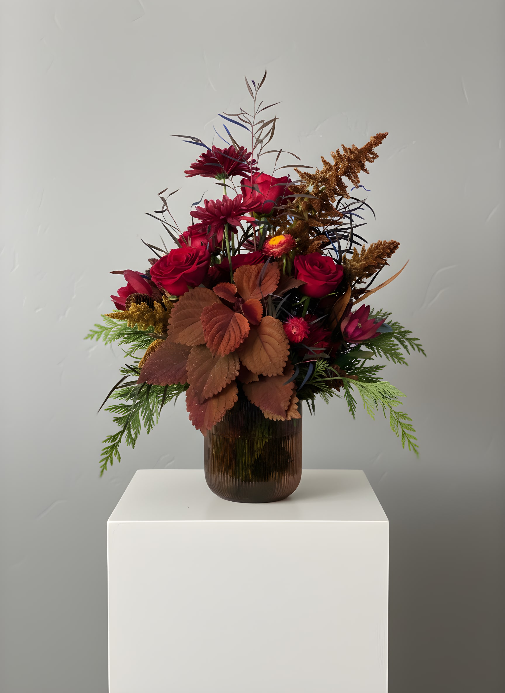 Christmas Designers Choice - Fresh and Wintery! Will likely include Reds, Greens, and Whites.   Let us choose the blooms for you! Get the best of our holiday season offerings designed just for you, delivered in a vase. 