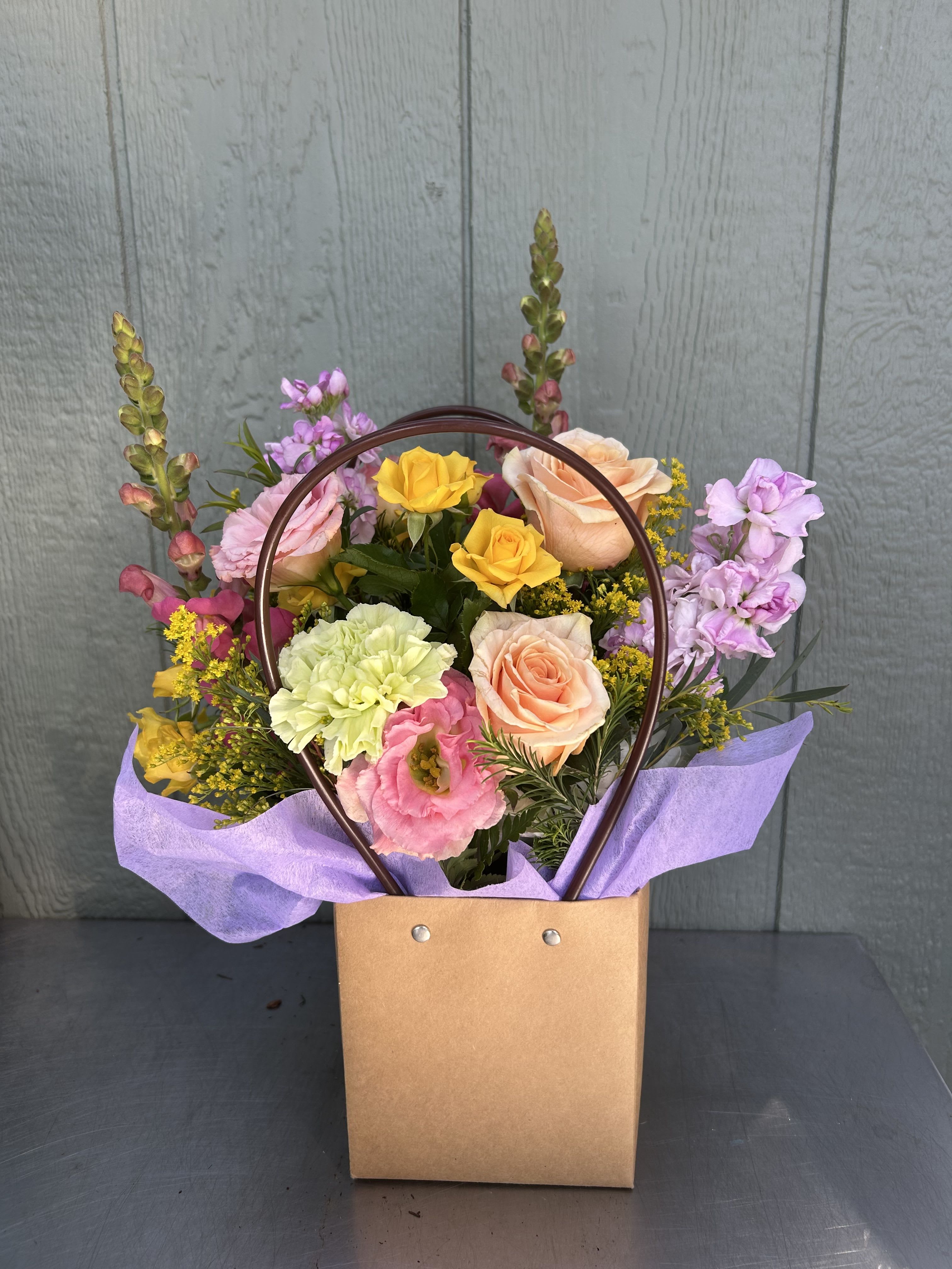 Blooming Bag  - A fun and unique arrangement of spring flowers for Mother's day! 