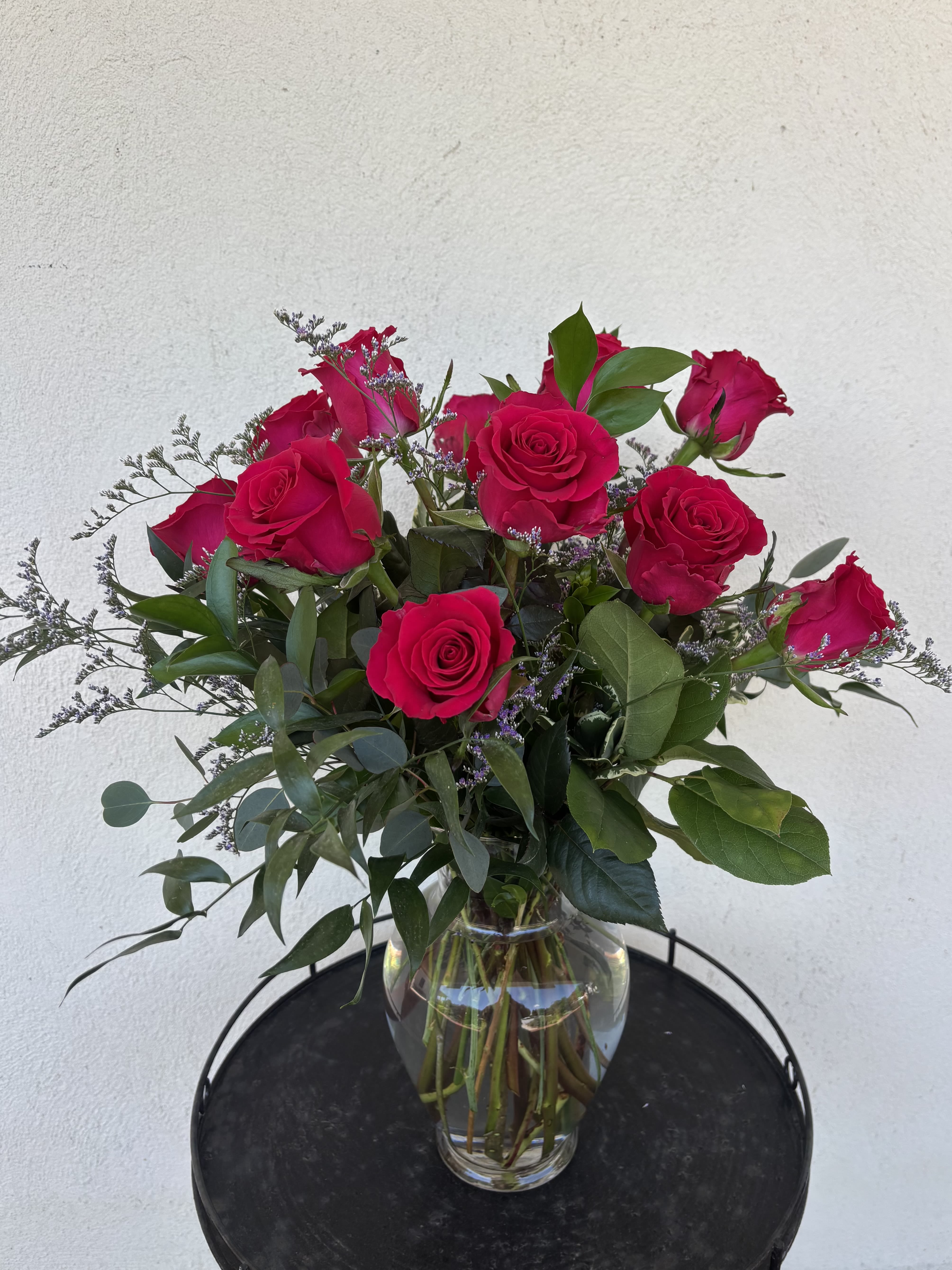 Hot Pink Dozen Roses - A dozen hot pink roses designed to make a bold, joyful statement. This arrangement brings energy, elegance, and a pop of color to any space