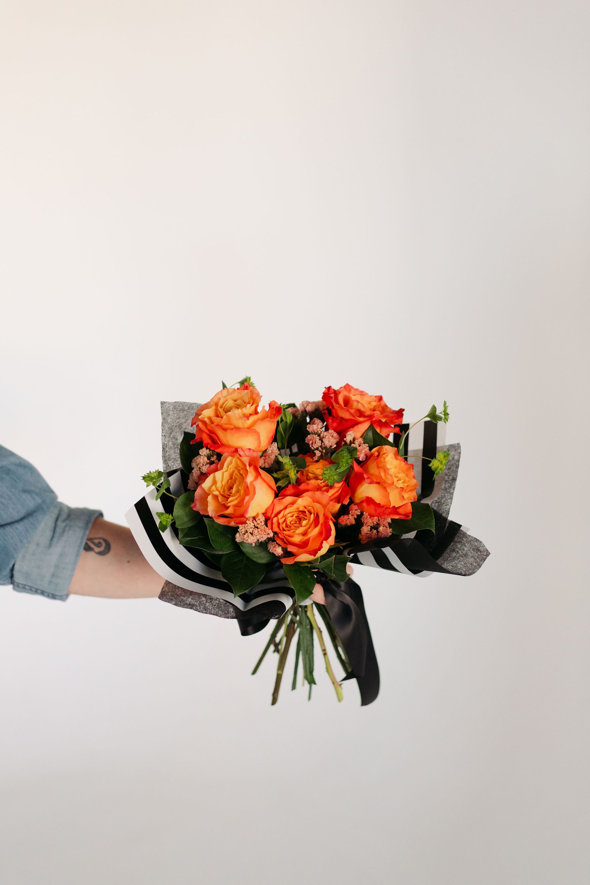 Spring Special Half Dozen Roses - A fiery, summer sunset, but if it were a hand-tied arrangement of roses... We use lush, two-toned Free Spirit roses in our special spring half-dozen rose arrangement as standard.  If you have a preference for another variety or color of rose, please let us know in the order notes, and we will try to accommodate, depending upon availability.