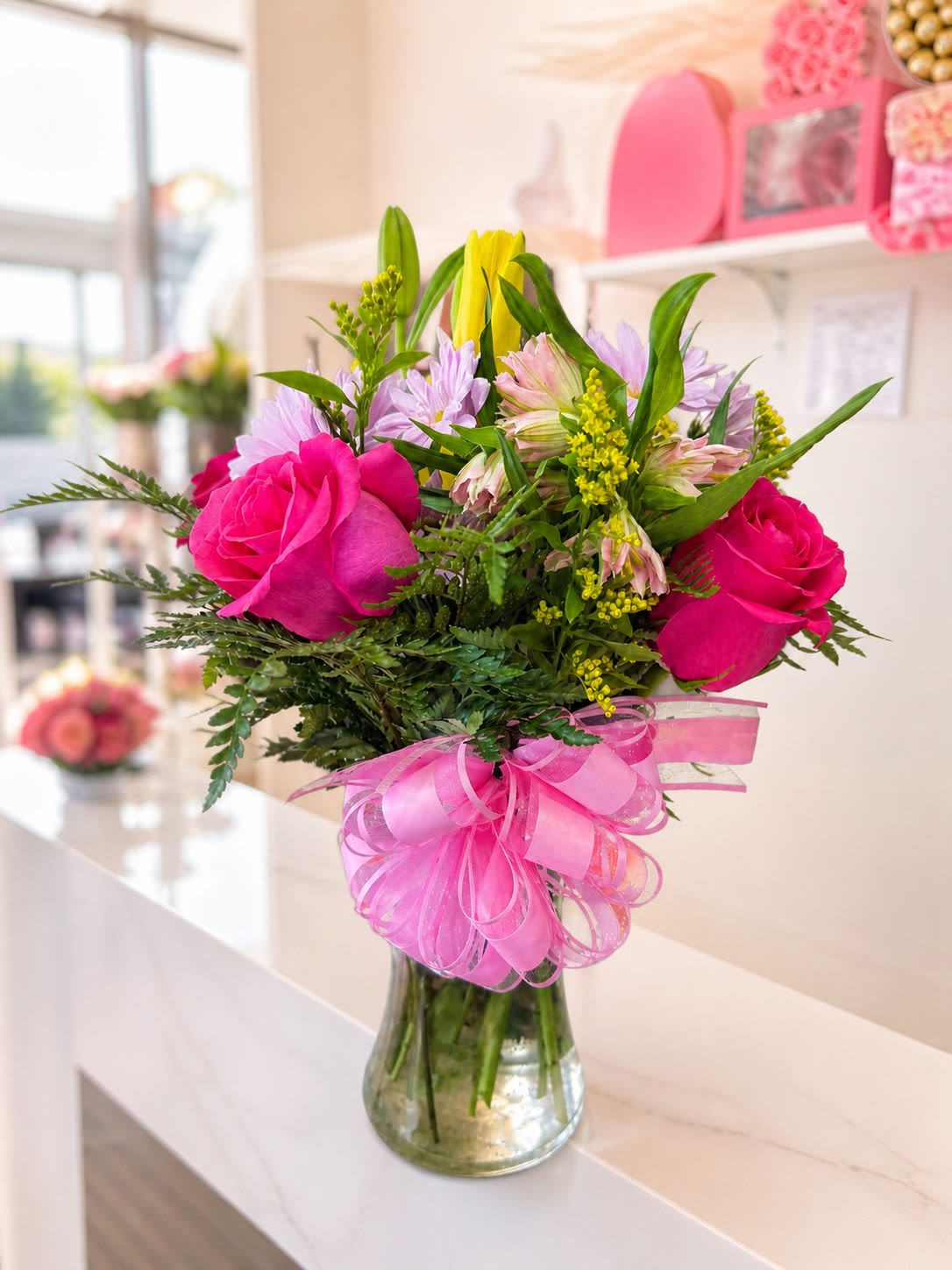 Love in Paris Mix - Mixed floral arrangement including gerberas, daisies, roses, and lilies.