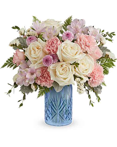 Blue Belle Bouquet  - The Blue Belle Bouquet features white roses, pink spray roses, lavender alstroemeria, pink carnations, lavender button spray chrysanthemums, and white sinuata statice, accented with dusty miller, parvifolia eucalyptus, and Cleopatra leatherleaf fern, in a Blue Belle Vase.