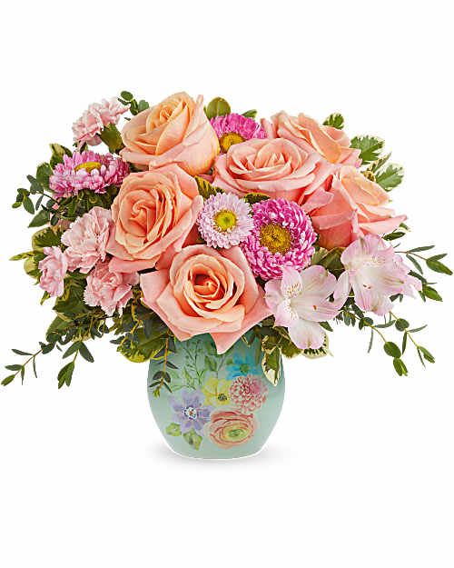 The Watercolor Garden Bouquet  - The Watercolor Garden Bouquet features peach roses, pink alstroemeria, miniature pink carnations, and pink Matsumoto asters, accented with parvifolia eucalyptus and variegated pittosporum, delivered in a Watercolor Garden Vase.