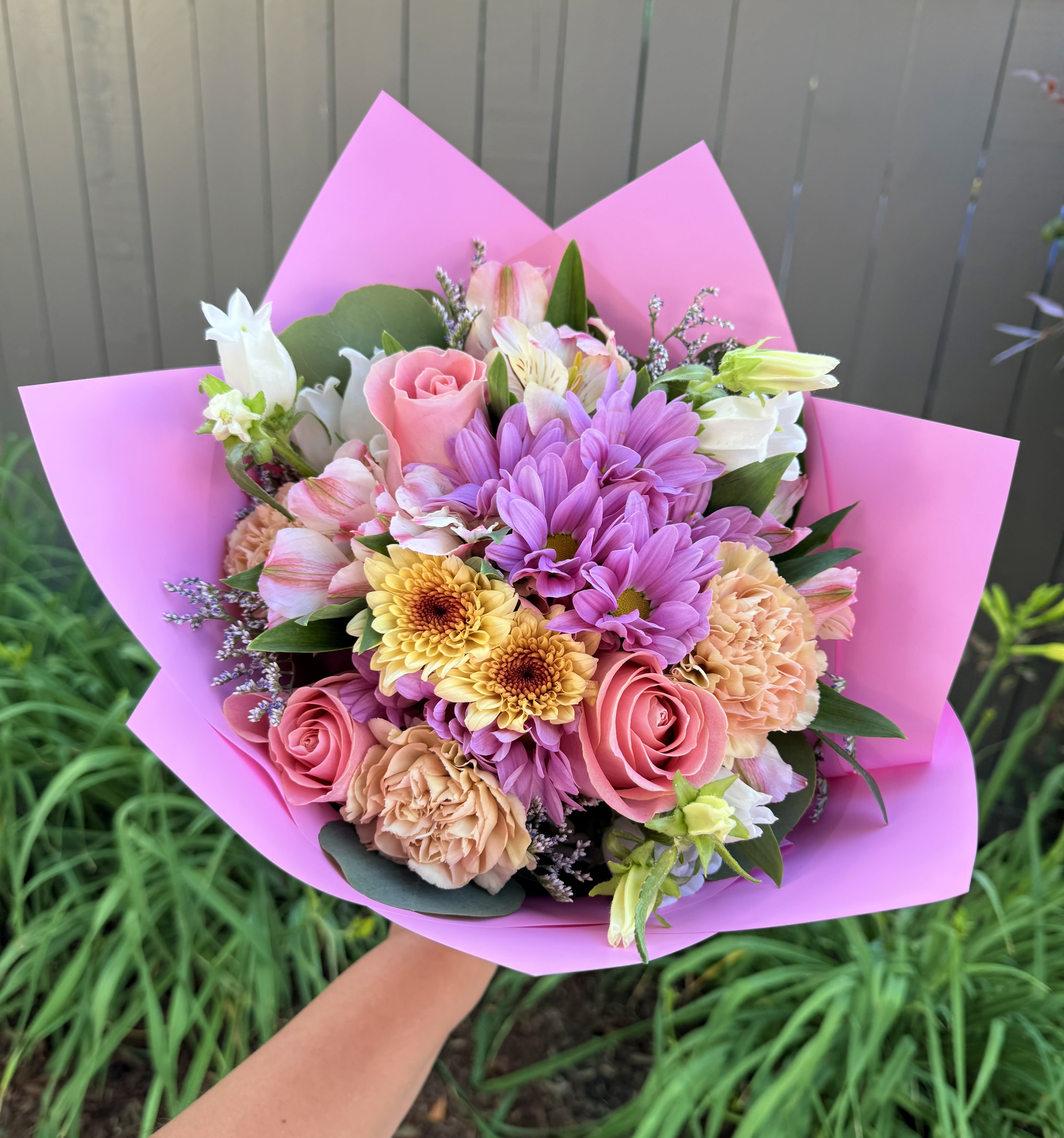 “ Cutie “ Bouquet  - A soft, garden-style bouquet that reads like a note of warm affection - perfect as a birthday bouquet, a Mother's Day gift, or a cheerful "just because" surprise. This cutie bouquet's pastel mix of pink and lavender immediately feels thoughtful,  so the person you're thinking of will feel celebrated, seen, and lifted the moment they unwrap it.  Standard size
