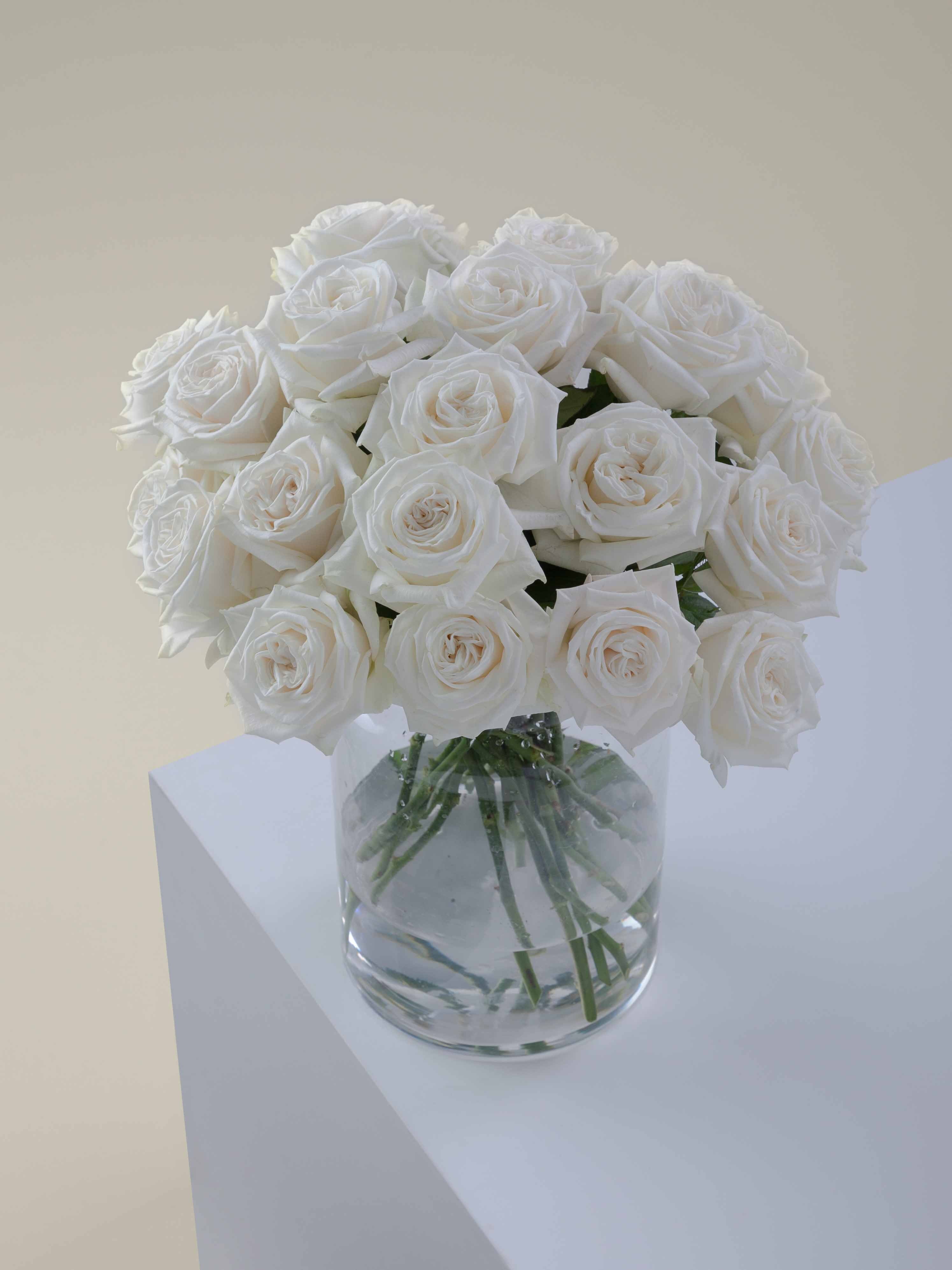 The Classic (12 Roses) - Fresh roses delivered from the heart of DTLA. The Classic is 12 hand-selected, farm-fresh roses available in 13 stunning varieties — from bold hot pinks to soft nudes and champagne tones. Choose your stem length (50cm), wrap style (ribbon).