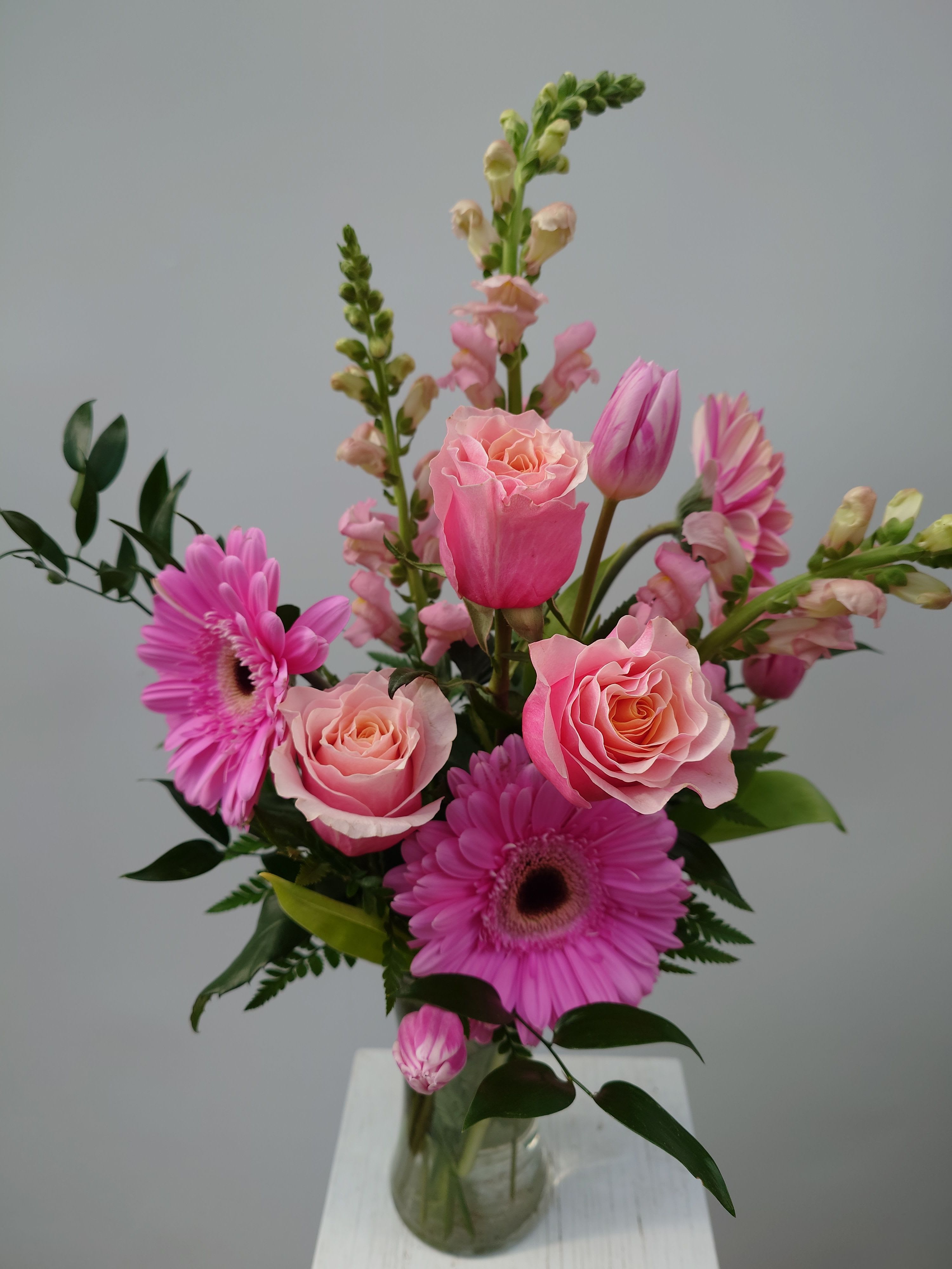 Pink Dreamer - Quench your favorite pink lover's need for all things pink! Featuring spectacular Pink Dreamer gerbera daisies, pink flamingo roses, marbled pink tulips, &amp; pink snapdragons. A real stunner!