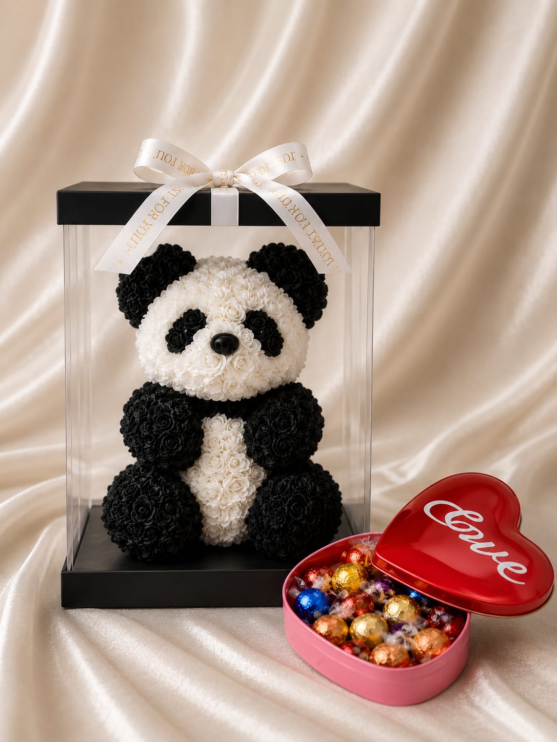 Rose Panda &amp; Chocolate Love Gift Set - A beautiful gift set featuring a handcrafted rose panda in a clear acrylic display box, paired with a heart-shaped tin filled with assorted Lindt Lindor chocolates. A sweet and memorable gift perfect for any special occasion.   Panda design may vary based on availability. Overall style and quality remain the same.”