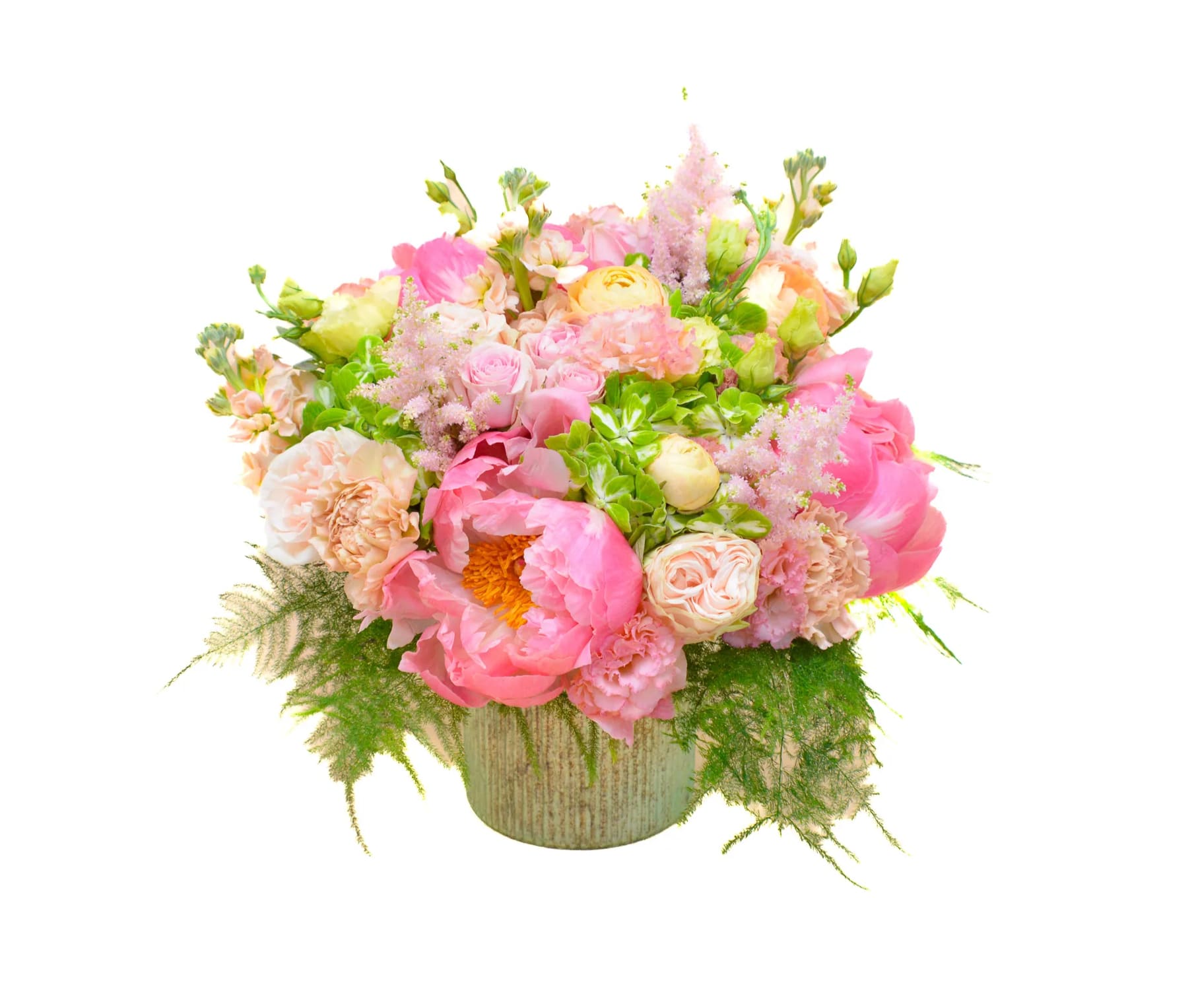 Coral Seduction - A sweet combination of colors, with coral peonies, pink roses, peach ranunculus and green hydrangea. Coral flowers, a pinkish-orange shade, which represents creativity, sincerity, empowerment and safety. The rich textures and colors of this bouquet lend a fresh, spring spirit that makes it a lovely choice for any occasion. Comes in a green glass cylinder vase. 