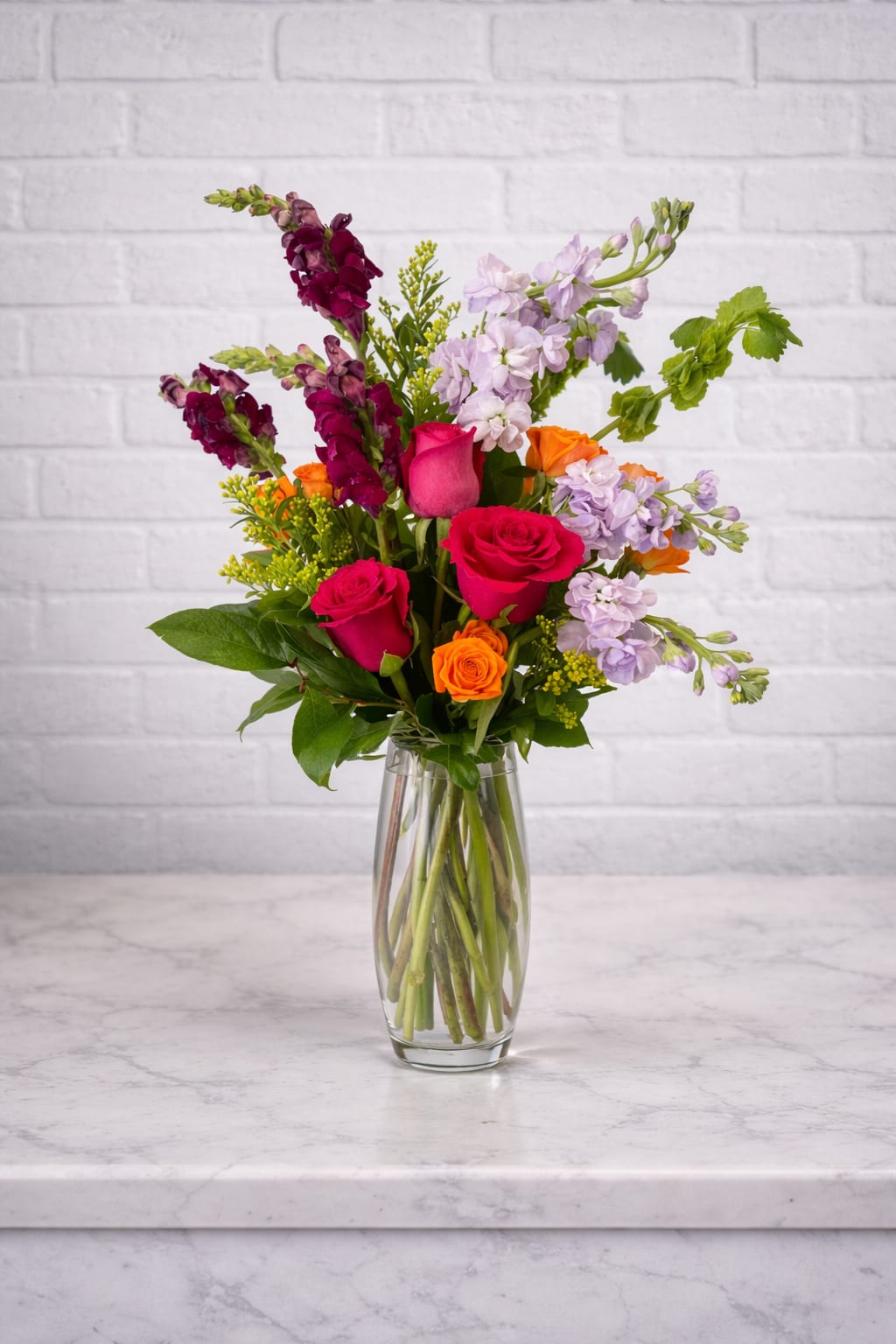 Color Crush  - Bright, bold color and airy movement make this Color Crush bouquet an uplifting choice for a birthday bouquet, congratulations arrangement, or a bright everyday gift for someone who loves vibrant florals.  