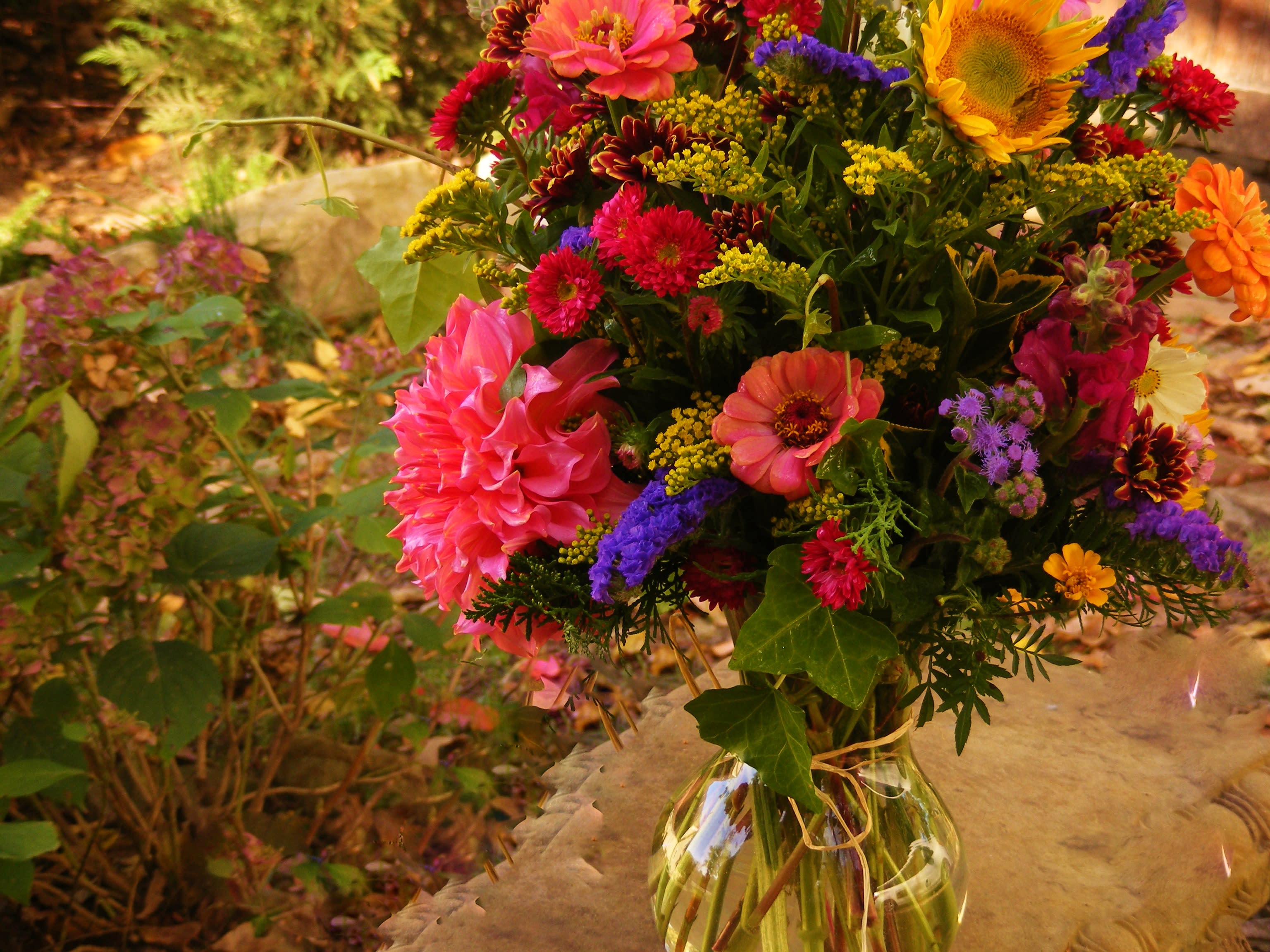 Colorful mixed bouquet in a clear glass vase