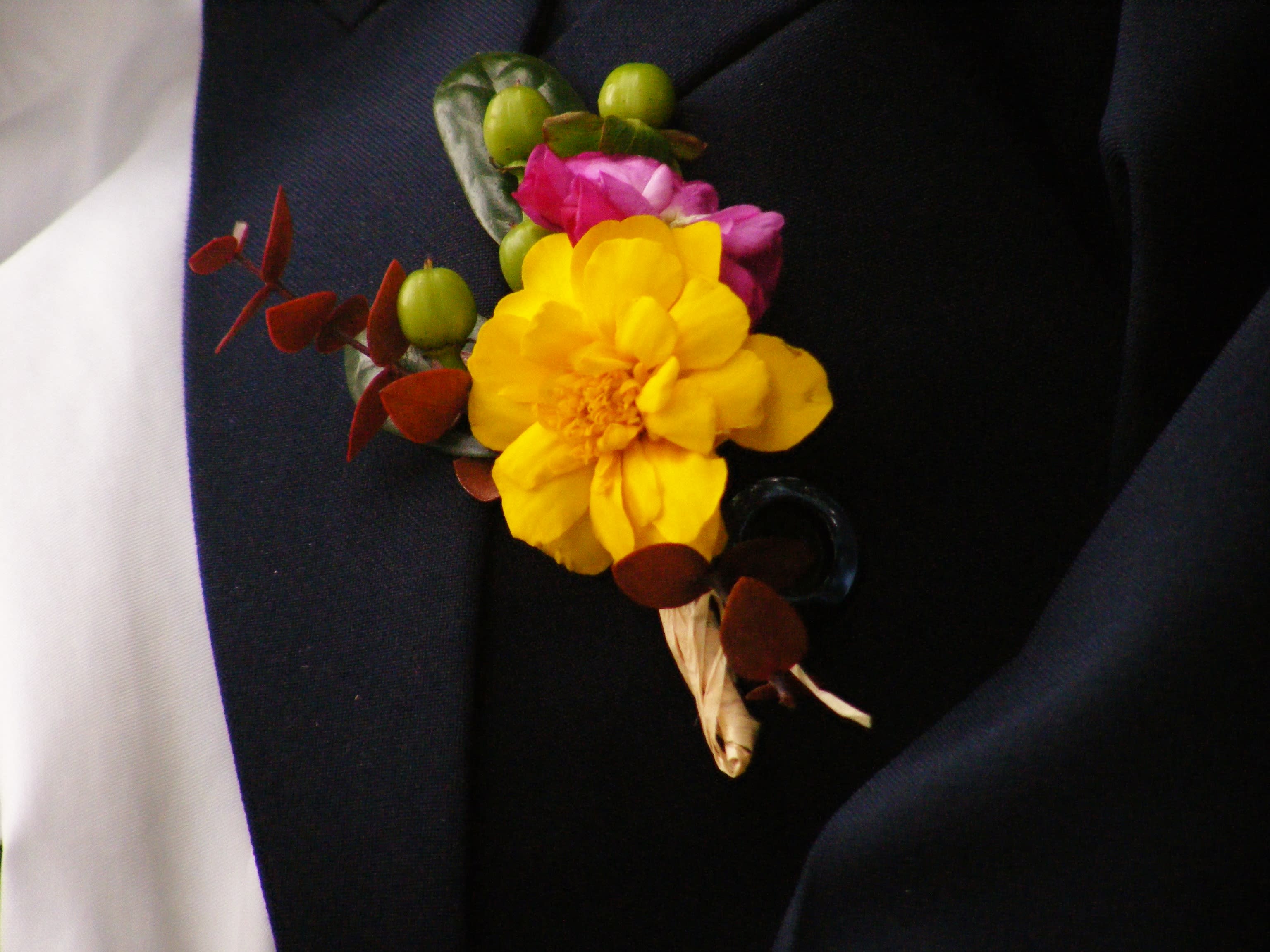 Smart Boutionniere - A Sensational Modern Twist for the  Groom!