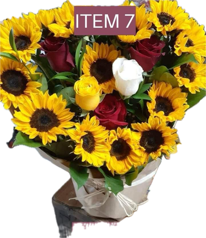 Bouquet of sunflowers and red, yellow, and white roses in white wrap