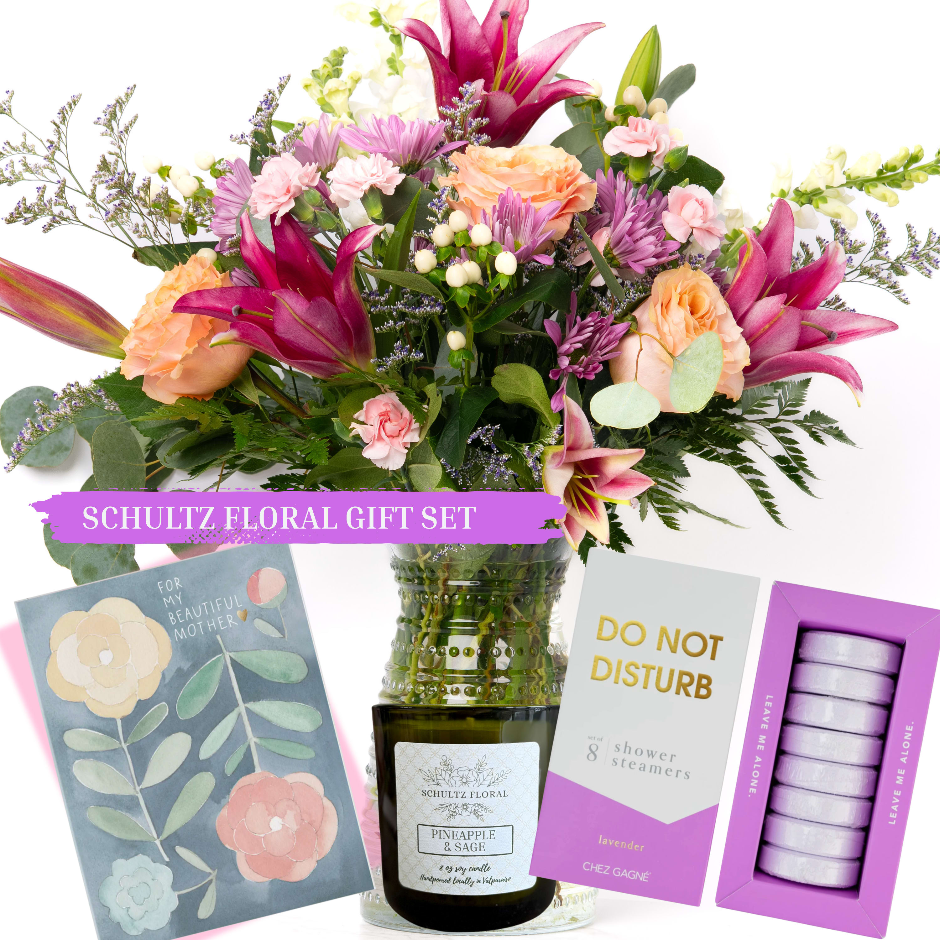 Our Mother's Day Collection: Lily Gift Set by Schultz Floral - Make a statement and celebrate your amazing Mom this Mother's Day with a tall floral mix paired with a locally poured candle (8 oz.), boutique shower steamers to help her relax, and a handwritten Mother's Day card. We've made it easy to say "You're the Best, Mom."  This gift bundle includes: - One "Lily" floral arrangement - One 8-piece Shower Steamer (Do Not Disturb (lavender), while supplies last; we may need to fulfill with an alternative, witty set) - One 8 ounce locally poured candle in our signature scent "Pineapple Sage." (Natural soy candle with cotton wick) - One handwritten Mother's Day card (designs will vary; include a your personal message during check out)